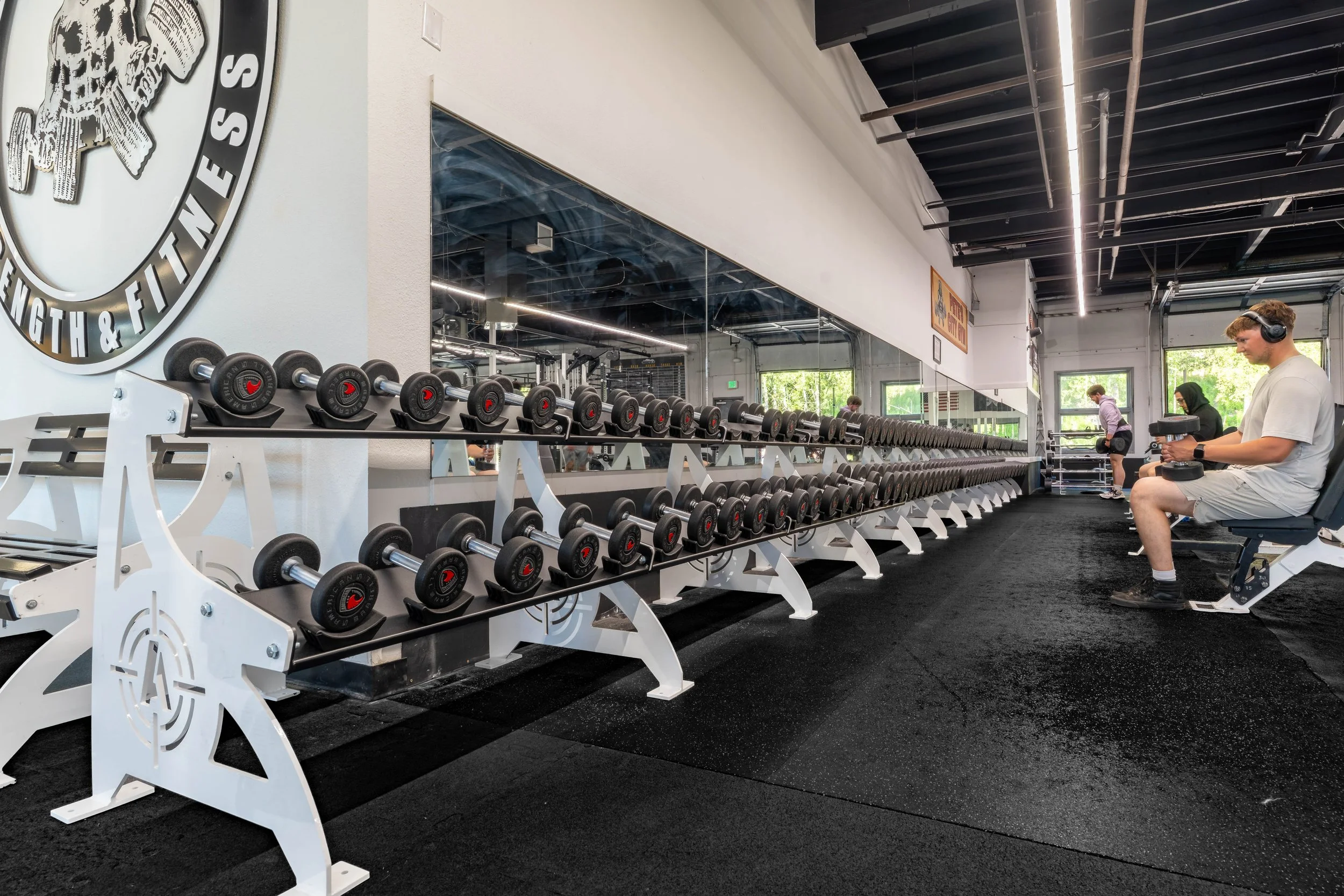 Free weight dumbbell area for strength training at Southside Strength and Fitness in Anchorage, Alaska