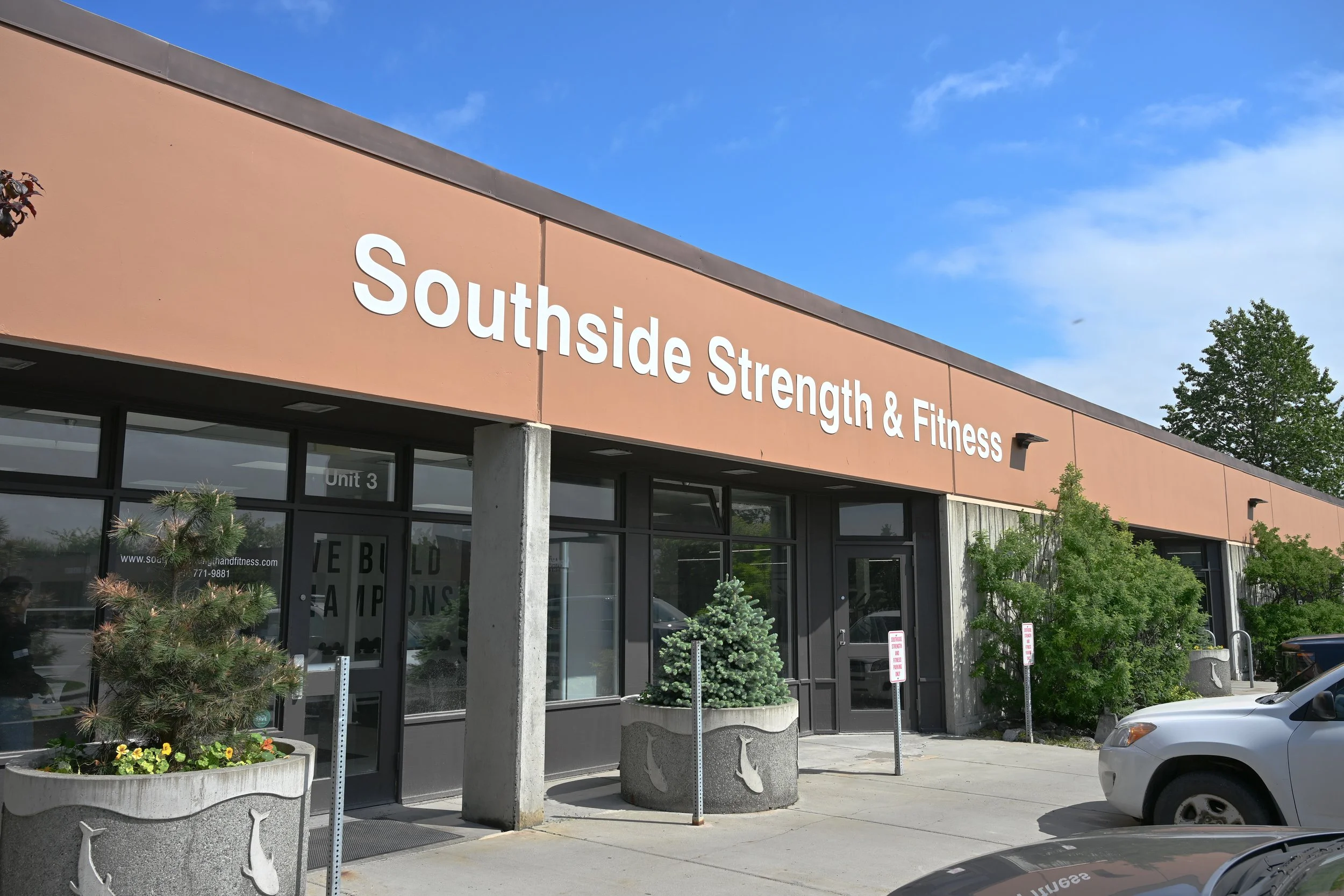 Exterior of Southside Strength and Fitness strength gym with signage in Anchorage, Alaska