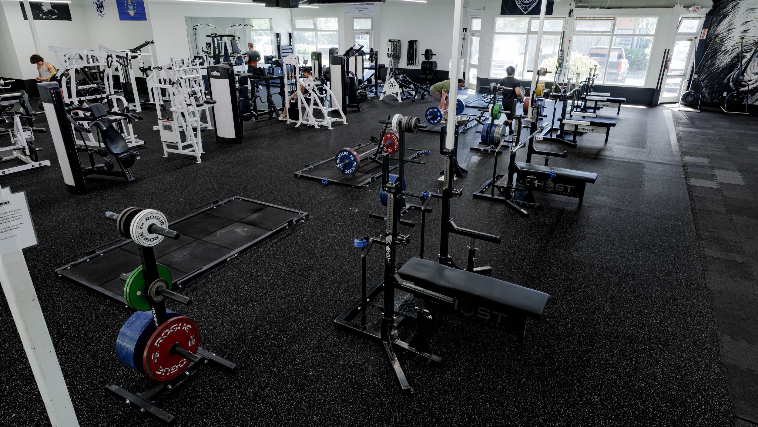 Powerlifting-focused training area at Southside Strength and Fitness with dedicated platforms, competition-style racks, and calibrated plates designed for serious strength training.