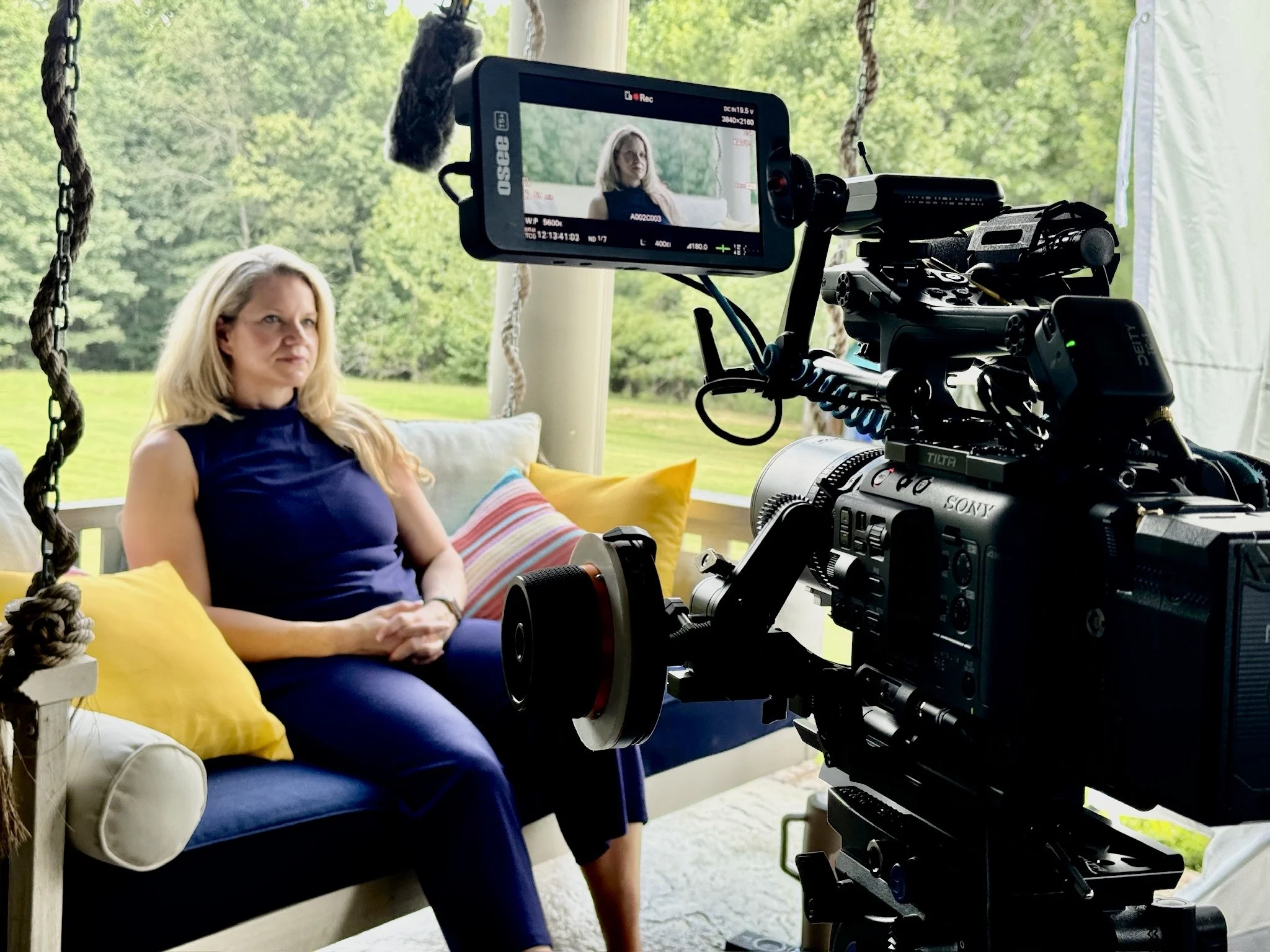 Amanda Maples sits for a video interview on her front porch in Waverly, Tennessee, sharing her experience of the devastating flood and her path forward.