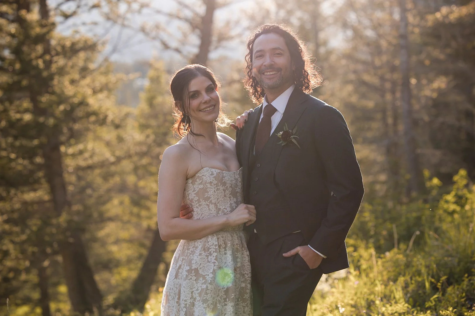 golden-hour-wedding-portraits-at-summer-wedding-reception-at-the-Alpine-Club-of-Canada-Clubhouse-in-Canmore-with-local-wedding-photographers-Wild-Alpine-Image-Co.