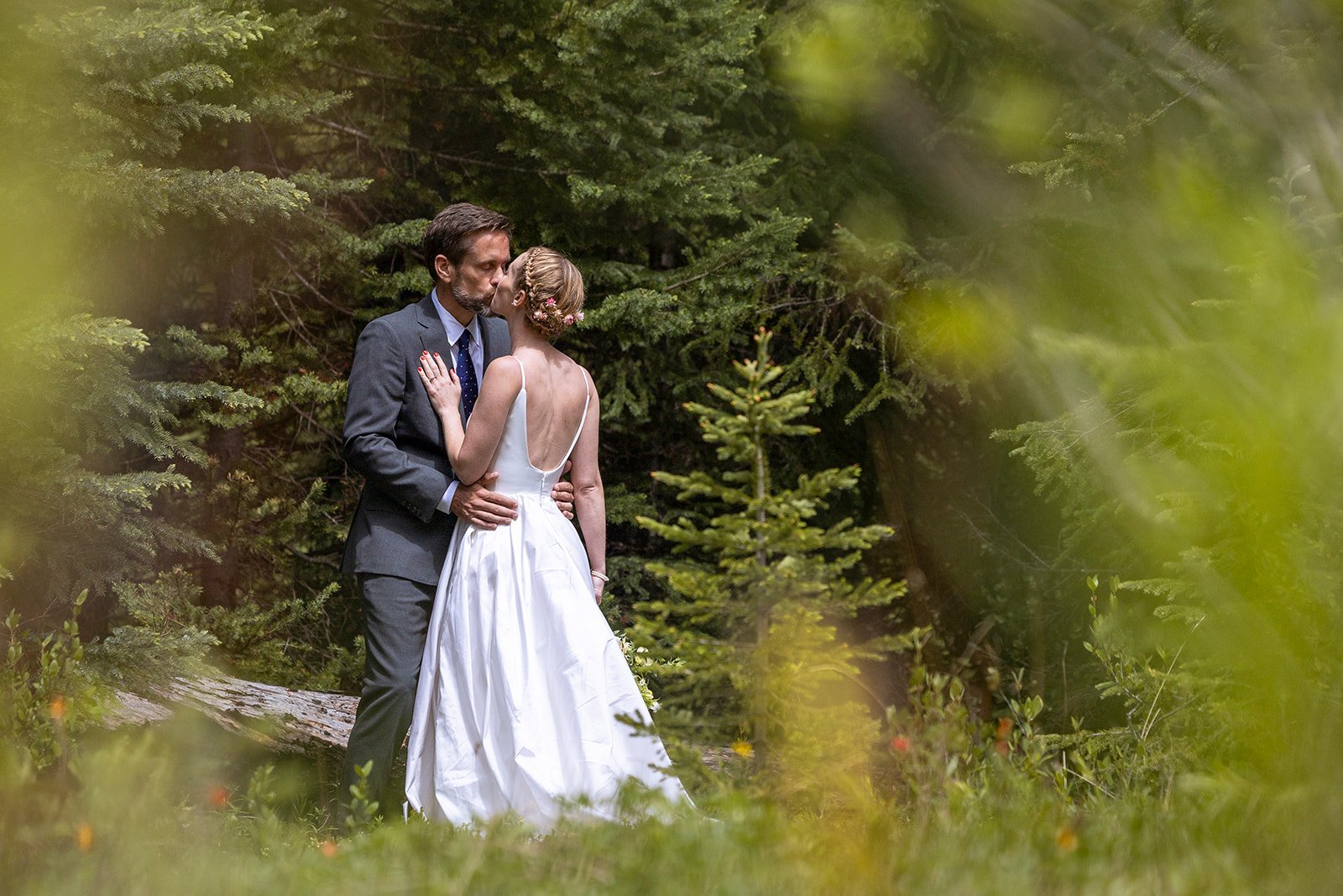 private-elopement-vow-exchange-in-banff-in-june-captured-by-banffs-local-heli-elopement-experts-Wild-Alpine-Image-Co.