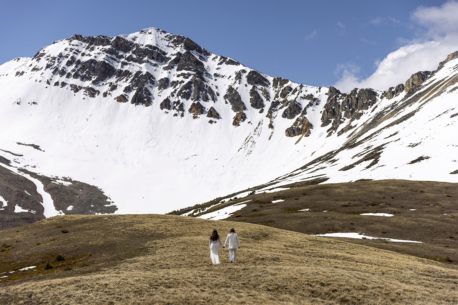 same-sex-elopement-at-rockies-heli-in-banff-national-park-planned-and-photographed-by-Wild-Alpine-Image-Co.-banff's-heli-elopement-experts