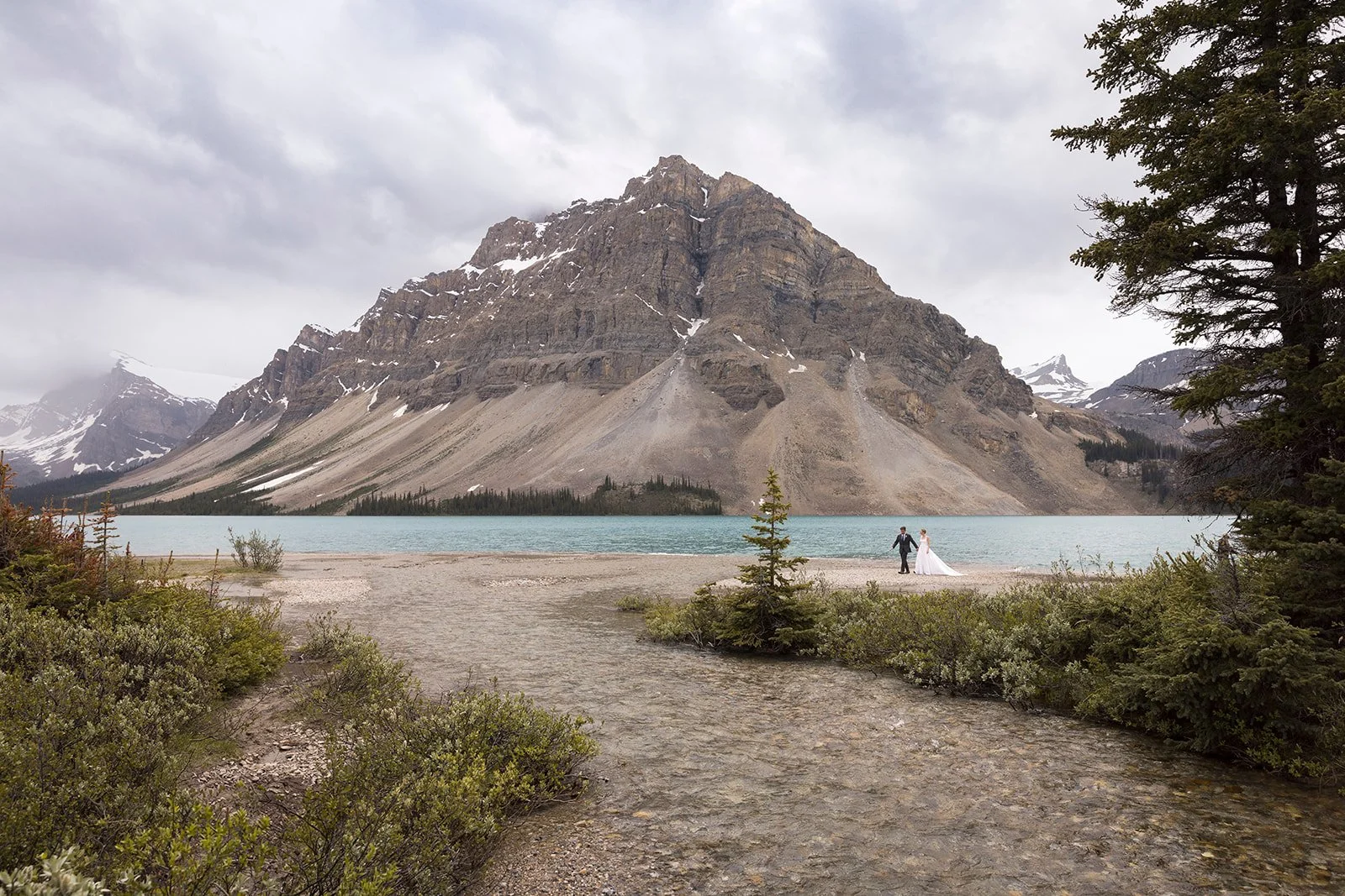 bow-lake-elopement-photos-in-banff-in-june-captured-by-banffs-local-heli-elopement-experts-Wild-Alpine-Image-Co.