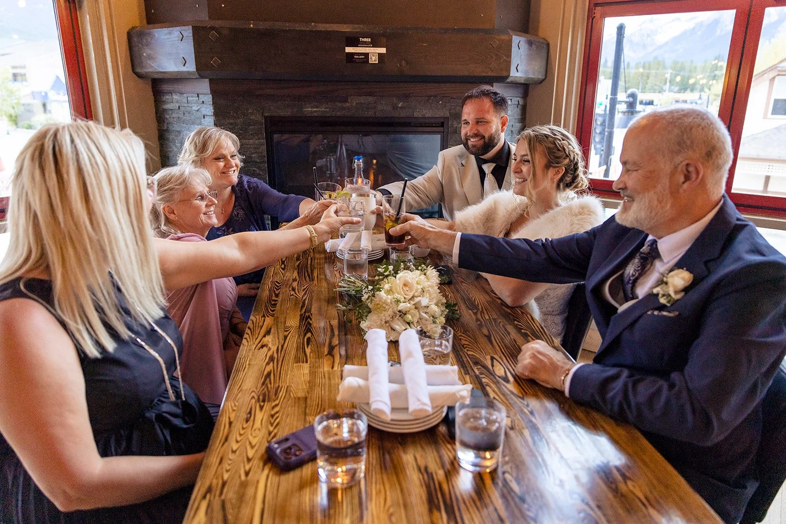 elopement-dinner-at-Murrieta's-bar-and-grill-photographed-by-Canmore's-bespoke-elopement-planners-and-photographers-Wild-Alpine-Image-Co.