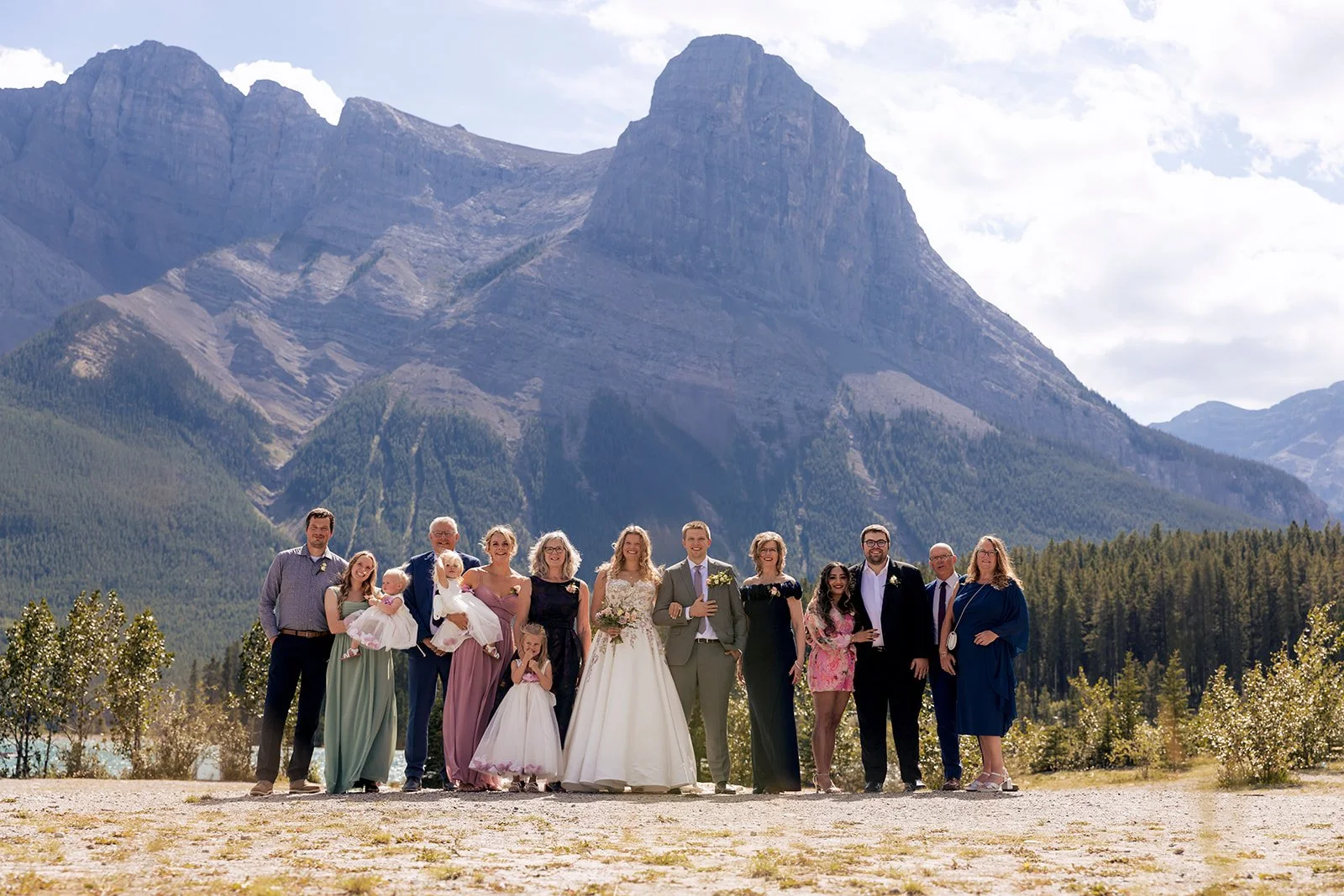 family wedding photos at rundleview forebay reservoir captured by canmore's local wedding photographers, Wild Alpine Image Co.