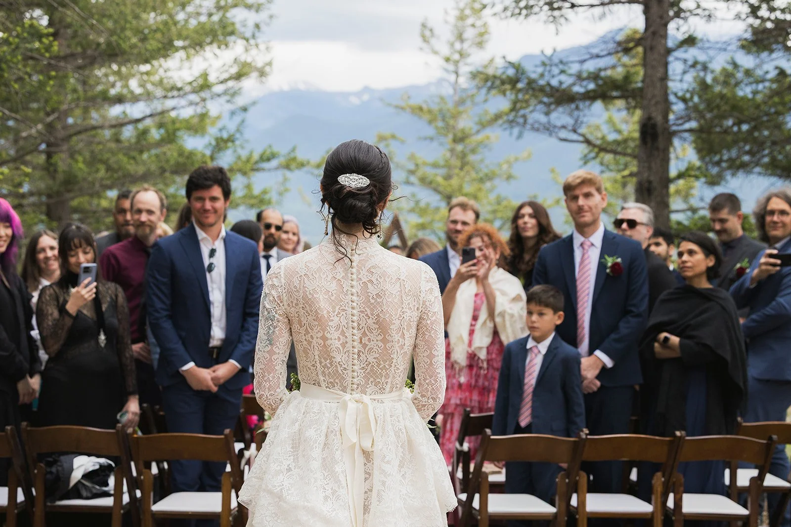 summer-wedding-ceremony-at-the-Alpine-Club-of-Canada-Clubhouse-in-Canmore-with-local-wedding-photographers-Wild-Alpine-Image-Co.