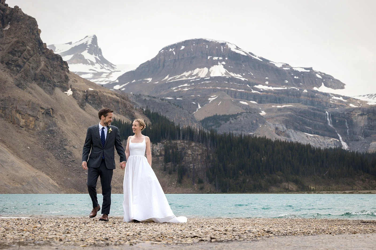 bow-lake-elopement-photos-in-banff-in-june-captured-by-banffs-local-heli-elopement-experts-Wild-Alpine-Image-Co.