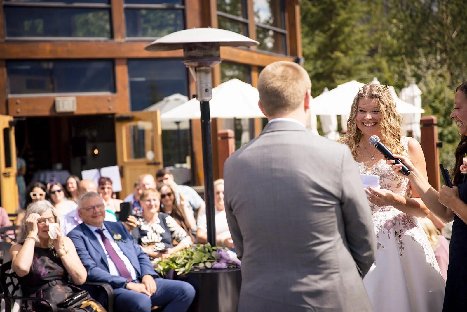 mid summer outdoor wedding ceremony at the iron goat capture by canmore's local wedding photographers, Wild Alpine Image Co.