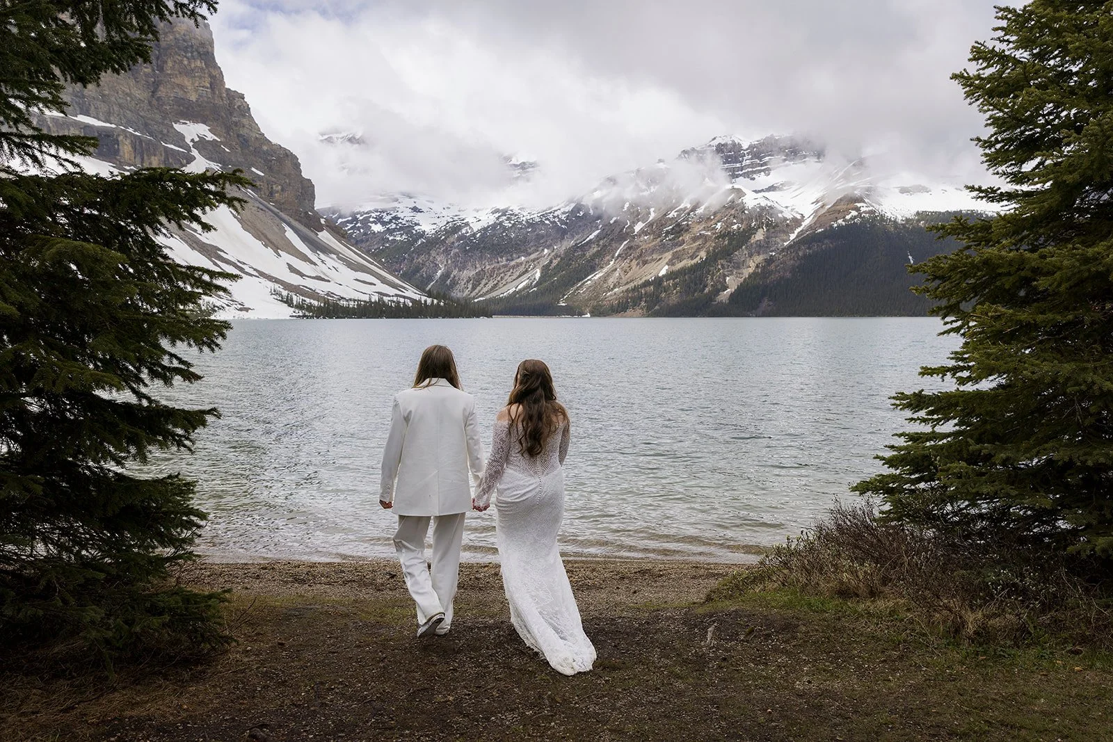 same-sex-elopement-ceremony-in-banff-national-park-planned-and-photographed-by-Wild-Alpine-Image-Co.-banff's-heli-elopement-experts