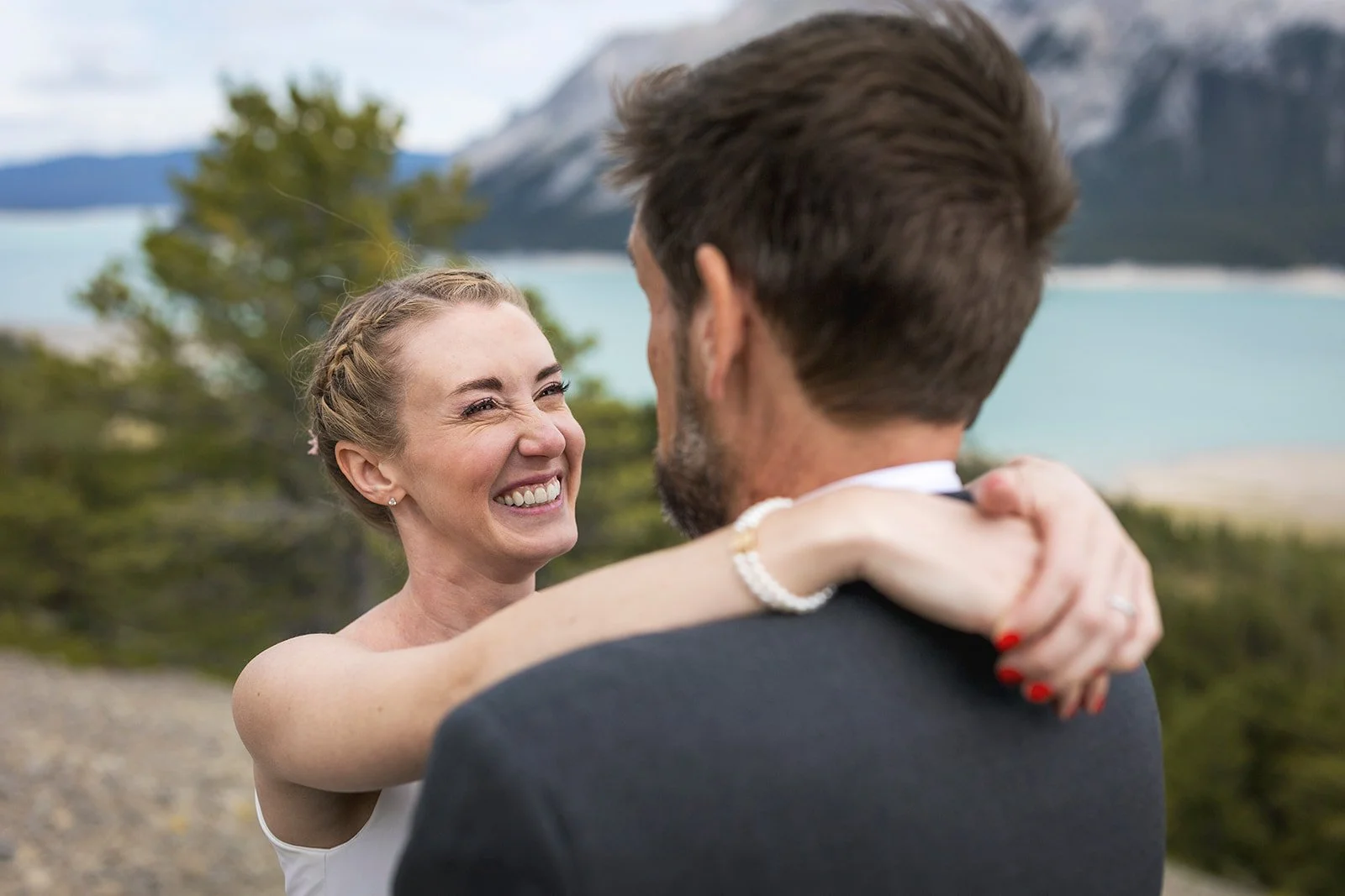 vision-quest-hiking-elopement-photos-in-banff-in-june-captured-by-banffs-local-heli-elopement-experts-Wild-Alpine-Image-Co.