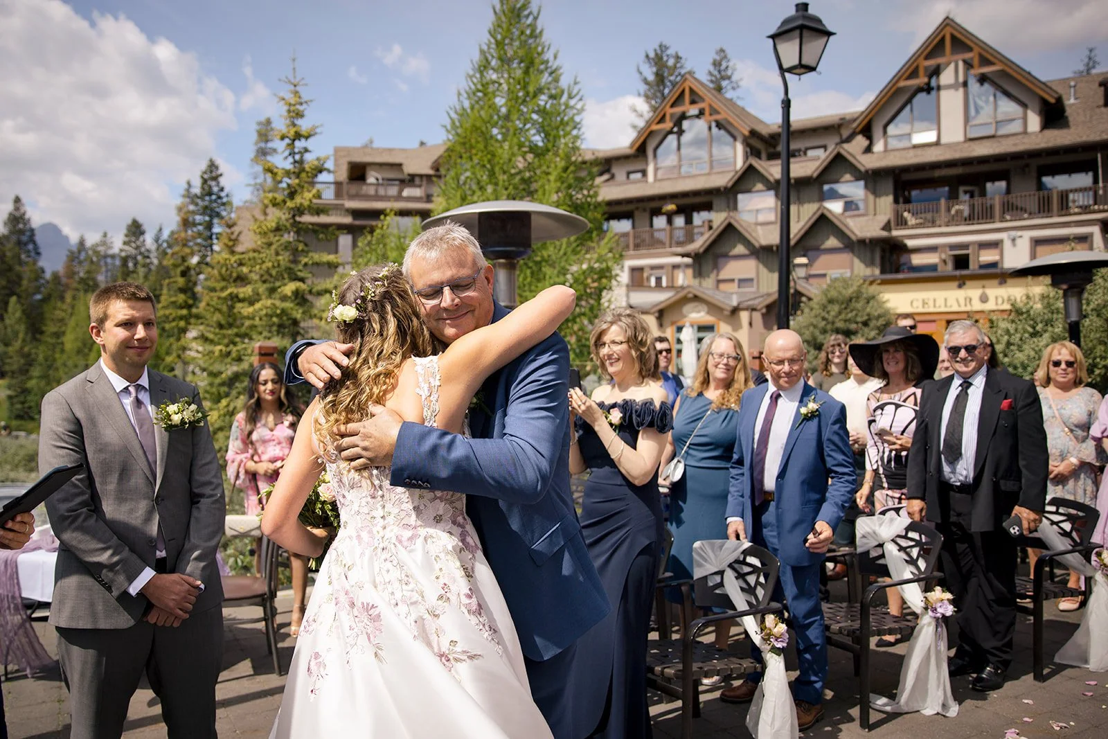 mid summer outdoor wedding ceremony at the iron goat capture by canmore's local wedding photographers, Wild Alpine Image Co.