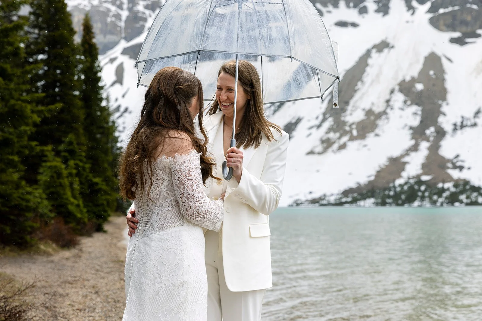 same-sex-elopement-ceremony-in-banff-national-park-planned-and-photographed-by-Wild-Alpine-Image-Co.-banff's-heli-elopement-experts