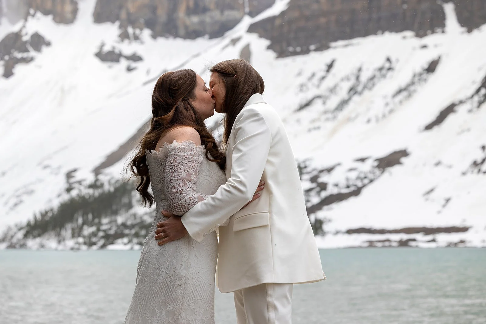 same-sex-elopement-ceremony-in-banff-national-park-planned-and-photographed-by-Wild-Alpine-Image-Co.-banff's-heli-elopement-experts