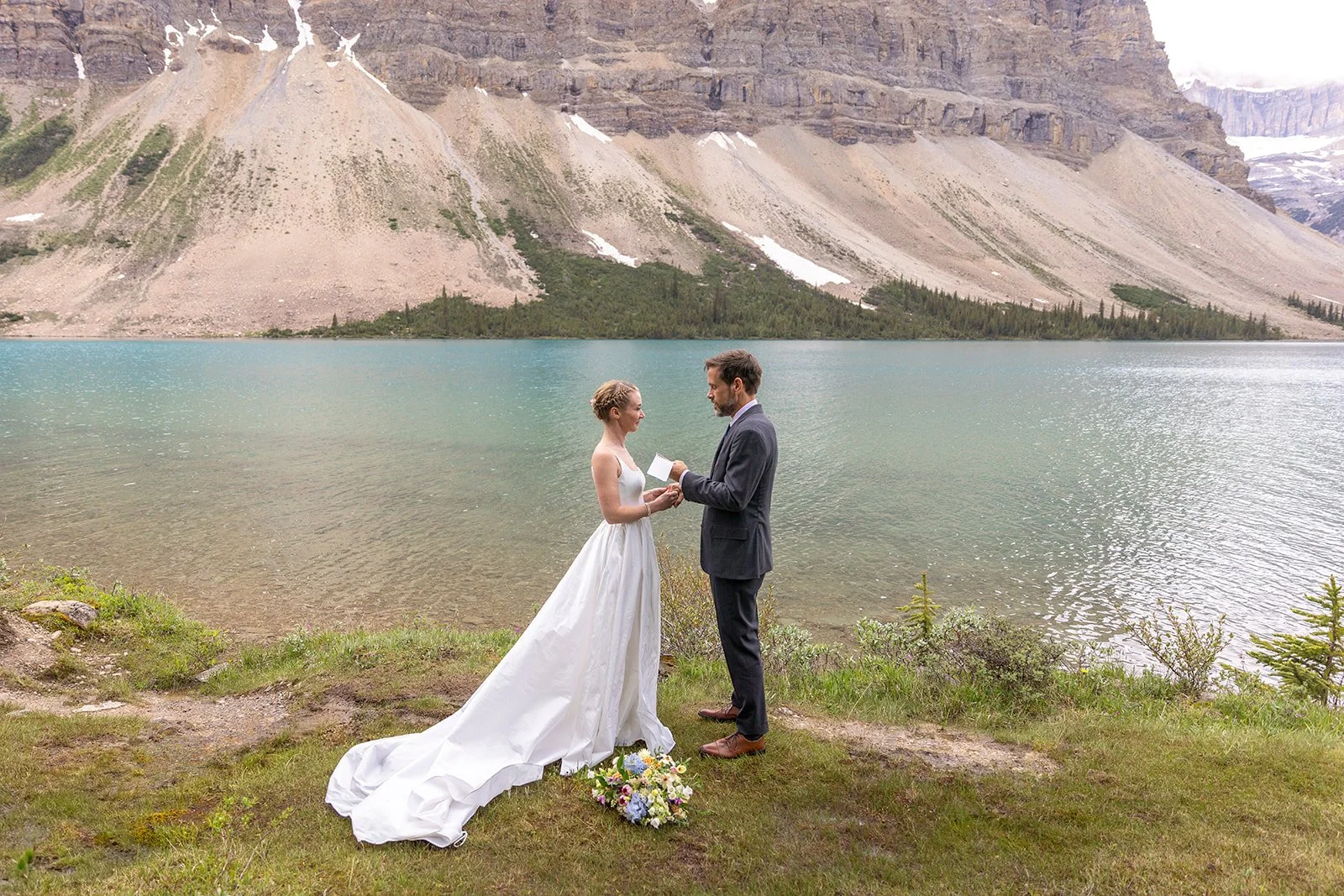 private-elopement-vow-exchange-in-banff-in-june-captured-by-banffs-local-heli-elopement-experts-Wild-Alpine-Image-Co.