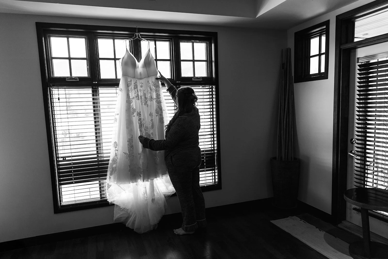 elopement-prep-photo-at-copper-point-resort-in-invermere-bc-with-Wild-Alpine-Image-Co.