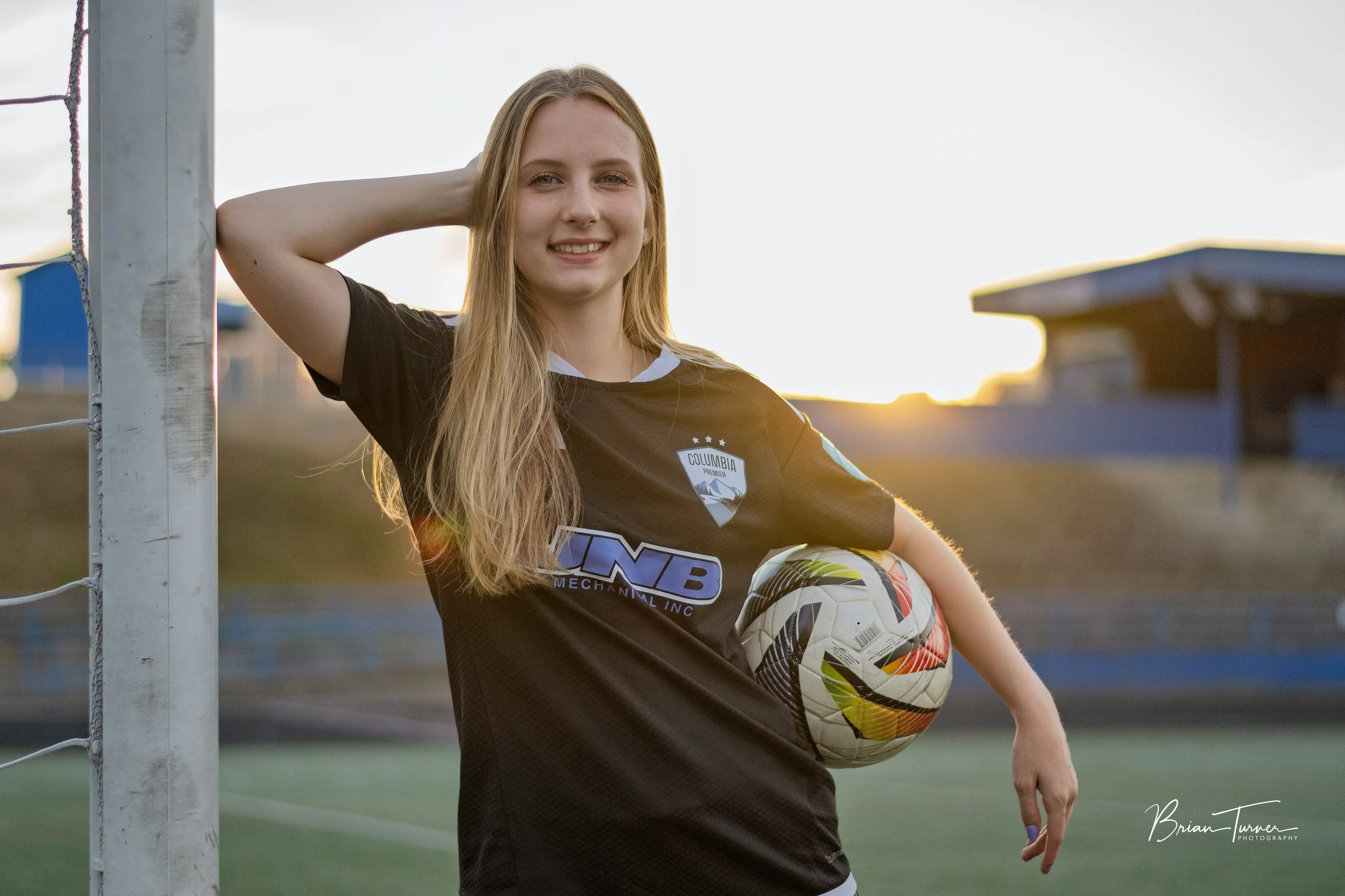 Senior portrait of a high school girl during a soccer session in Ridgefield WA by Brian Turner Photography