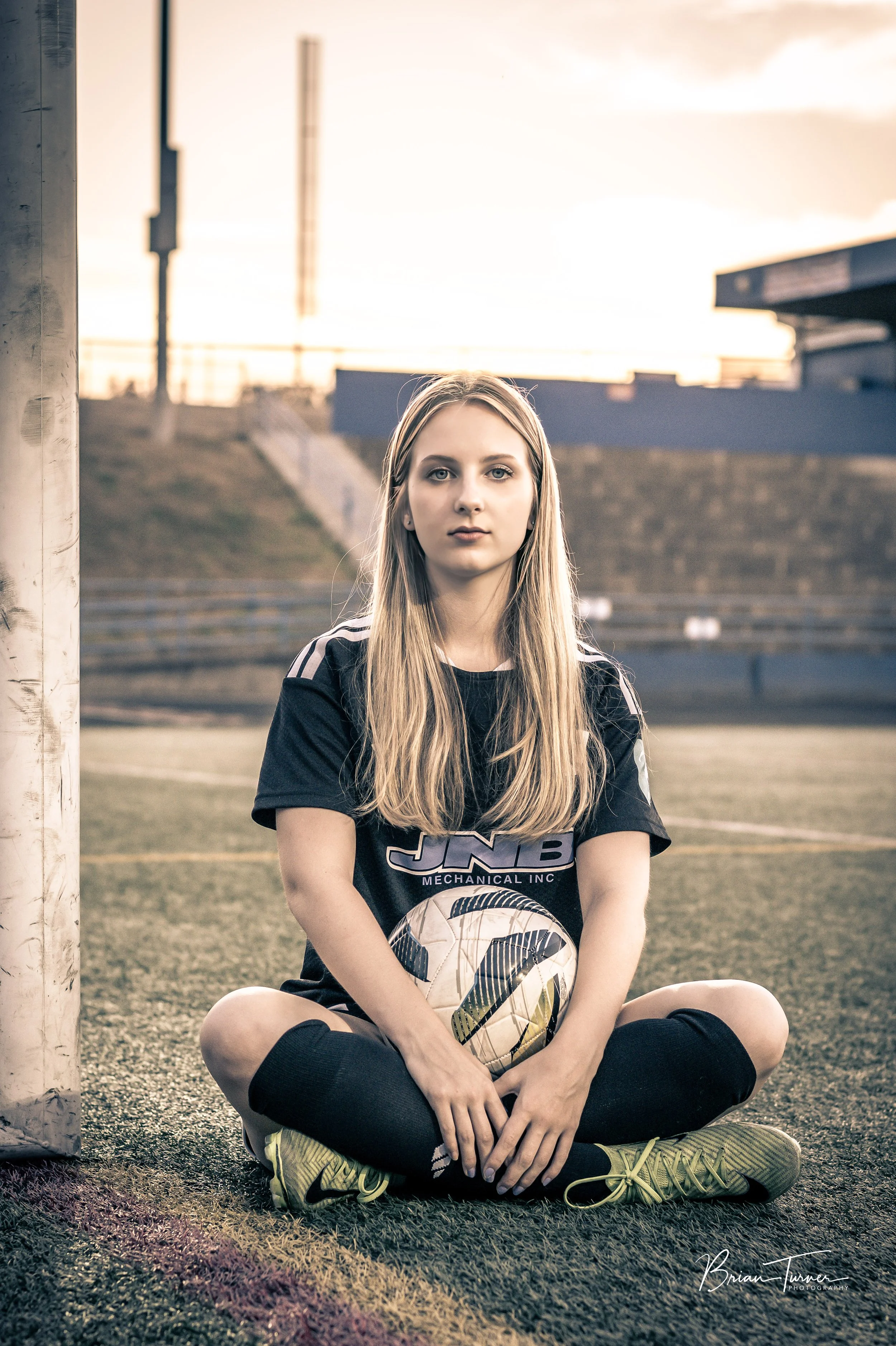 Senior portrait of a high school girl during a soccer session in Ridgefield WA by Brian Turner Photography