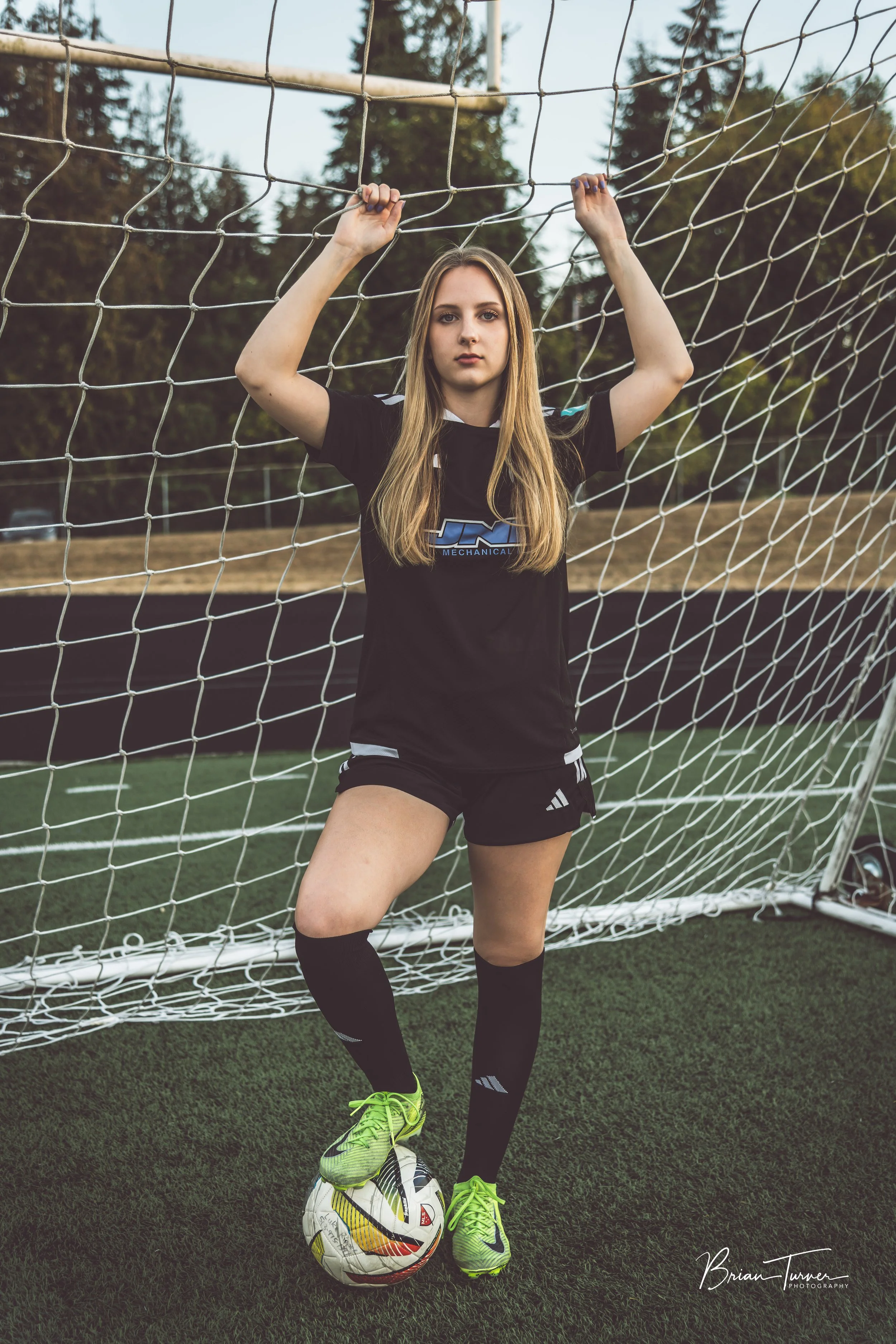Senior portrait of a high school girl during a soccer session in Ridgefield WA by Brian Turner Photography