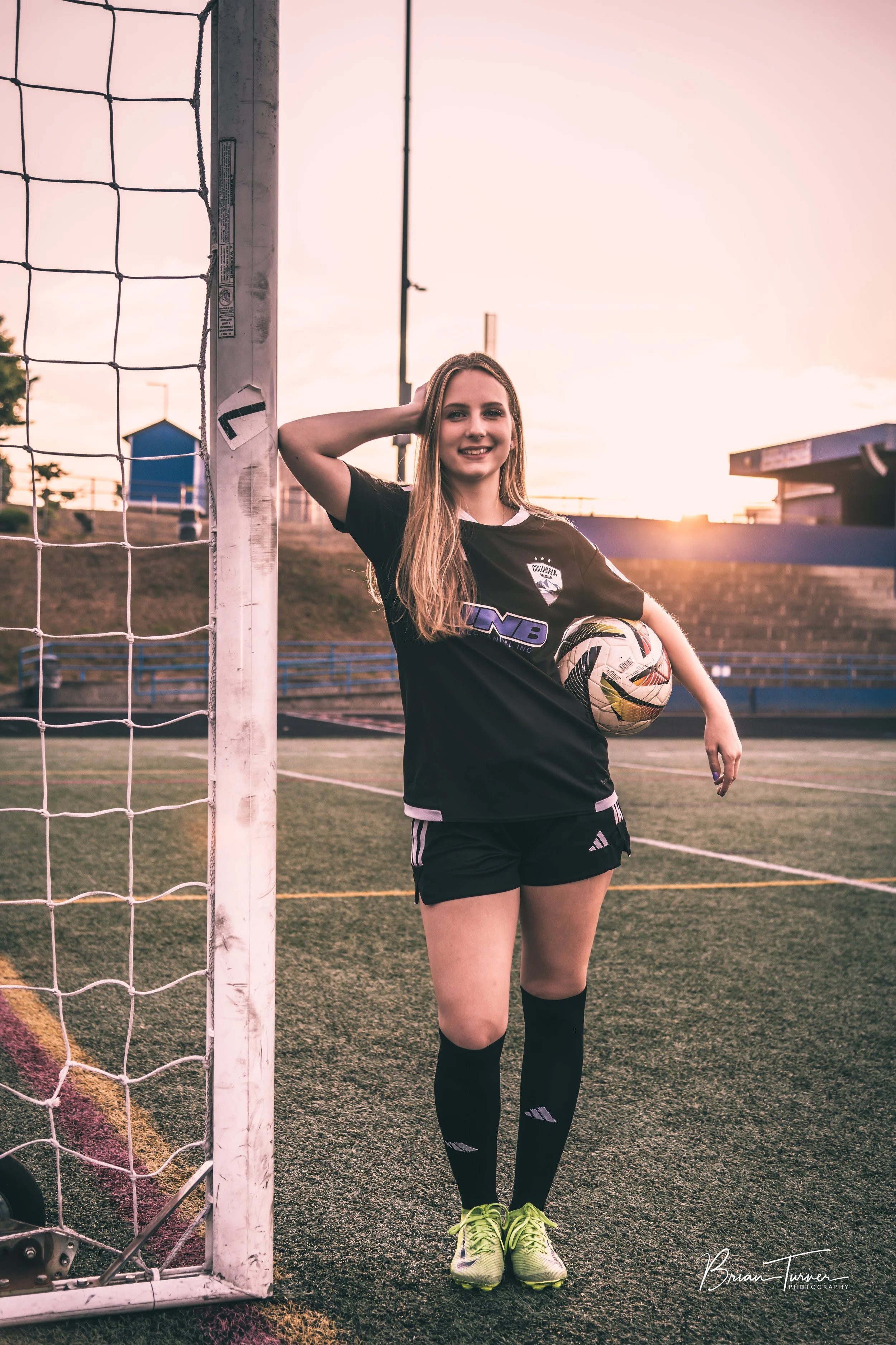 Senior portrait of a high school girl during a soccer session in Ridgefield WA by Brian Turner Photography