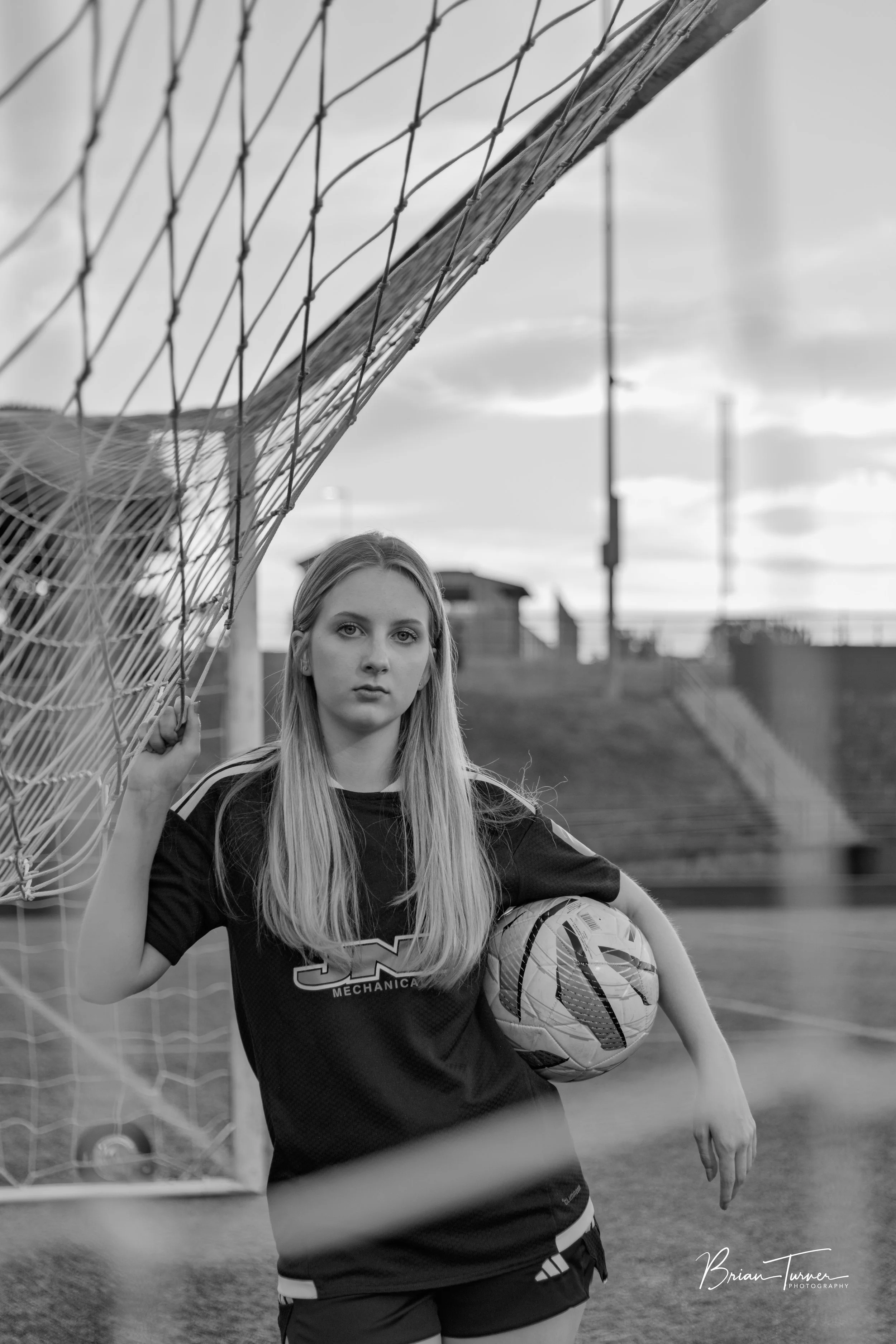 Senior portrait of a high school girl during a soccer session in Ridgefield WA by Brian Turner Photography