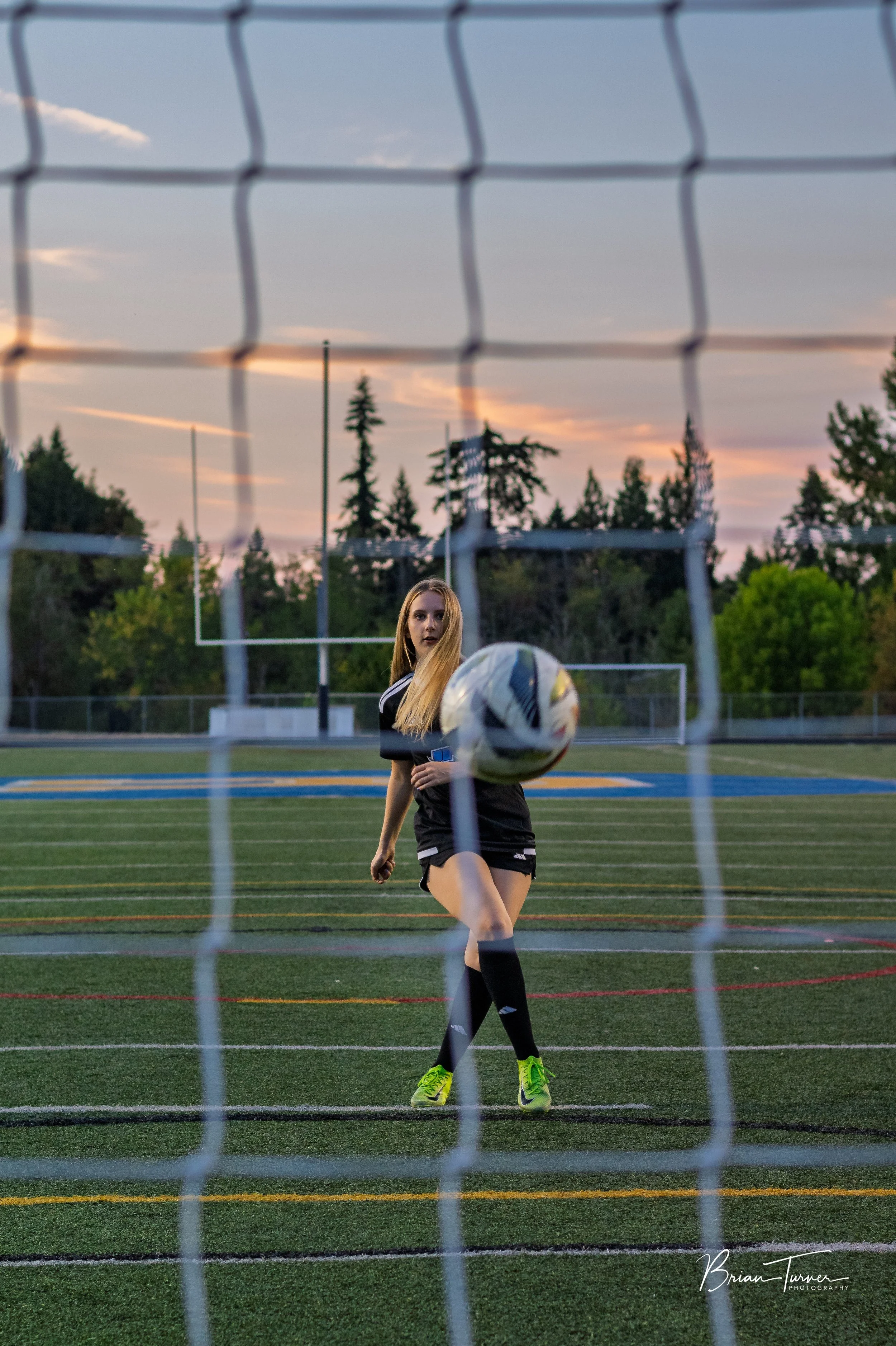 Senior portrait of a high school girl during a soccer session in Ridgefield WA by Brian Turner Photography