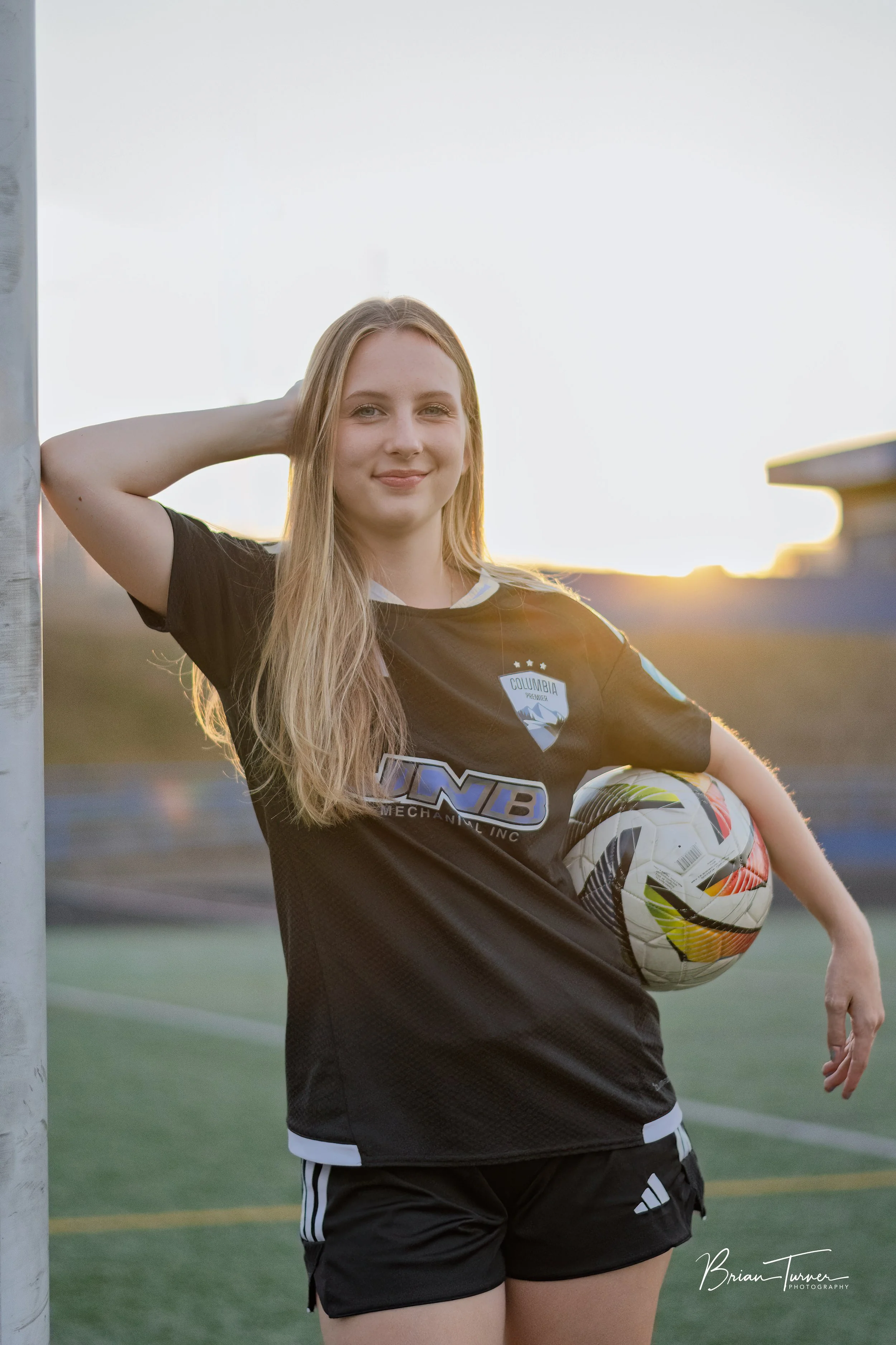 Senior portrait of a high school girl during a soccer session in Ridgefield WA by Brian Turner Photography