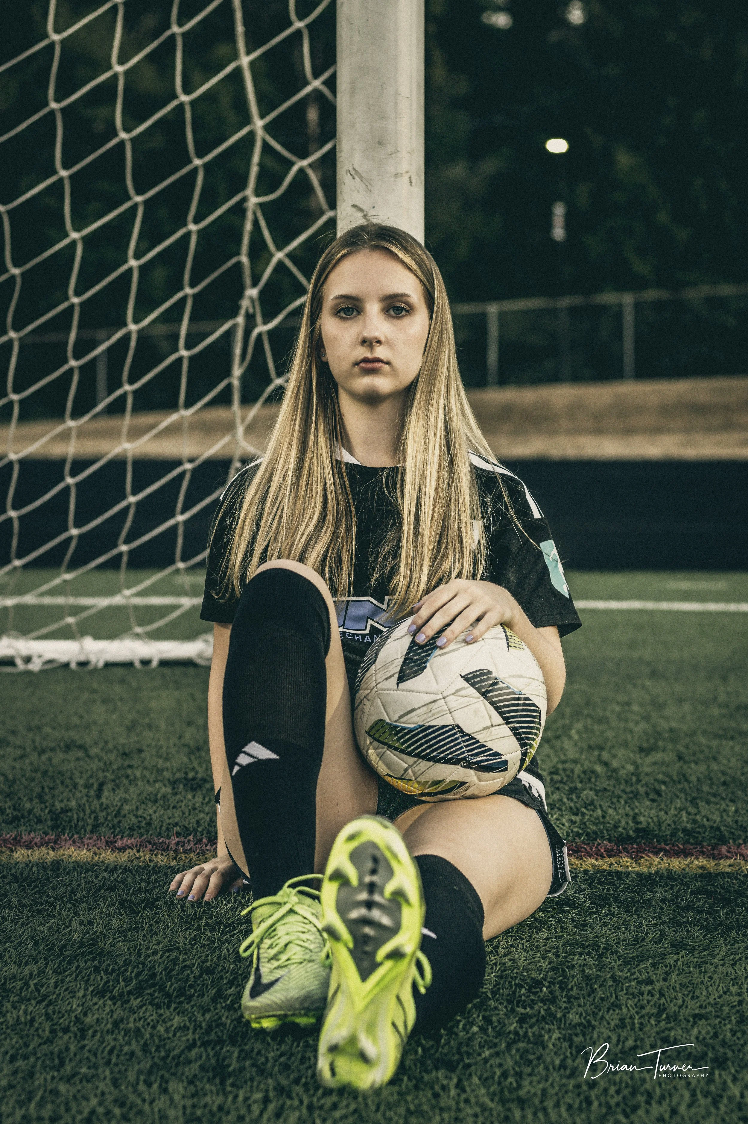 Senior portrait of a high school girl during a soccer session in Ridgefield WA by Brian Turner Photography