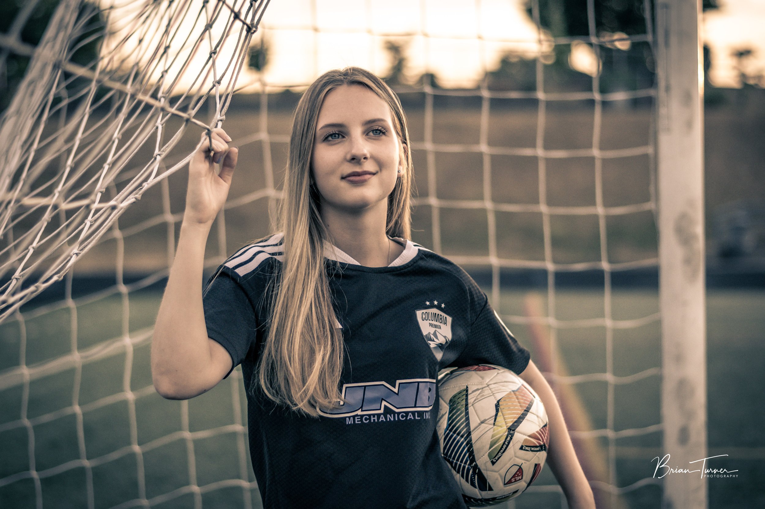 Senior portrait of a high school girl during a soccer session in Ridgefield WA by Brian Turner Photography