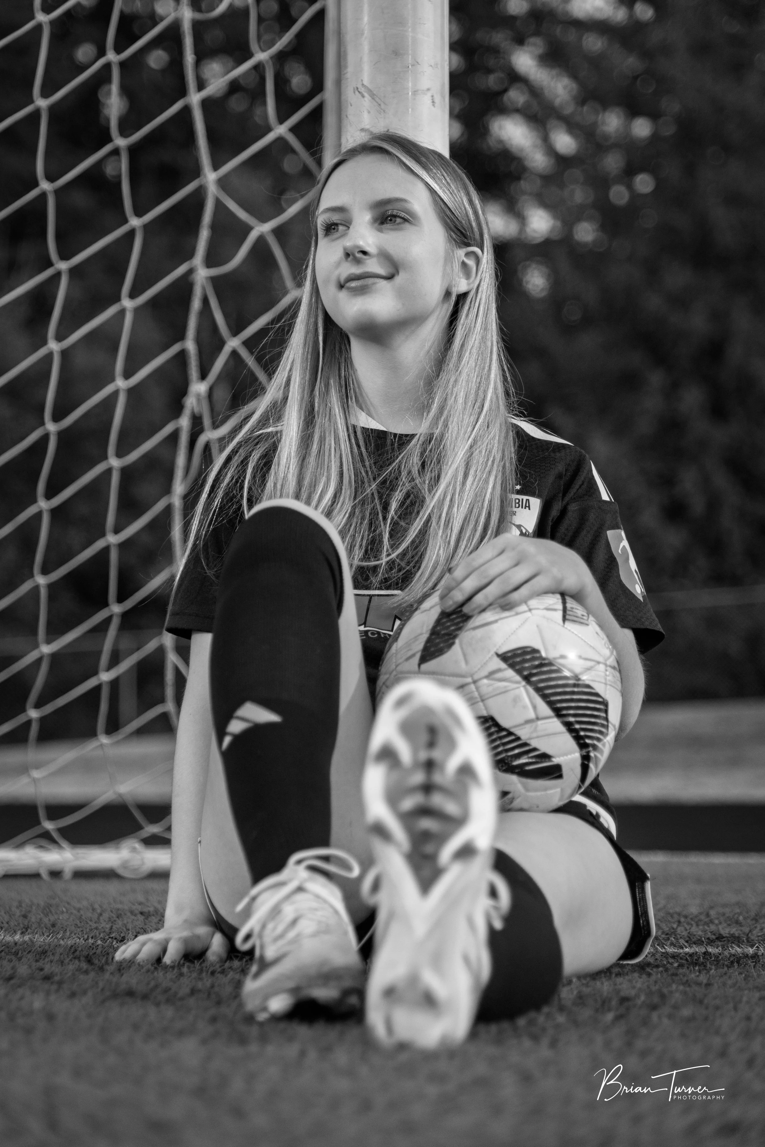 Senior portrait of a high school girl during a soccer session in Ridgefield WA by Brian Turner Photography