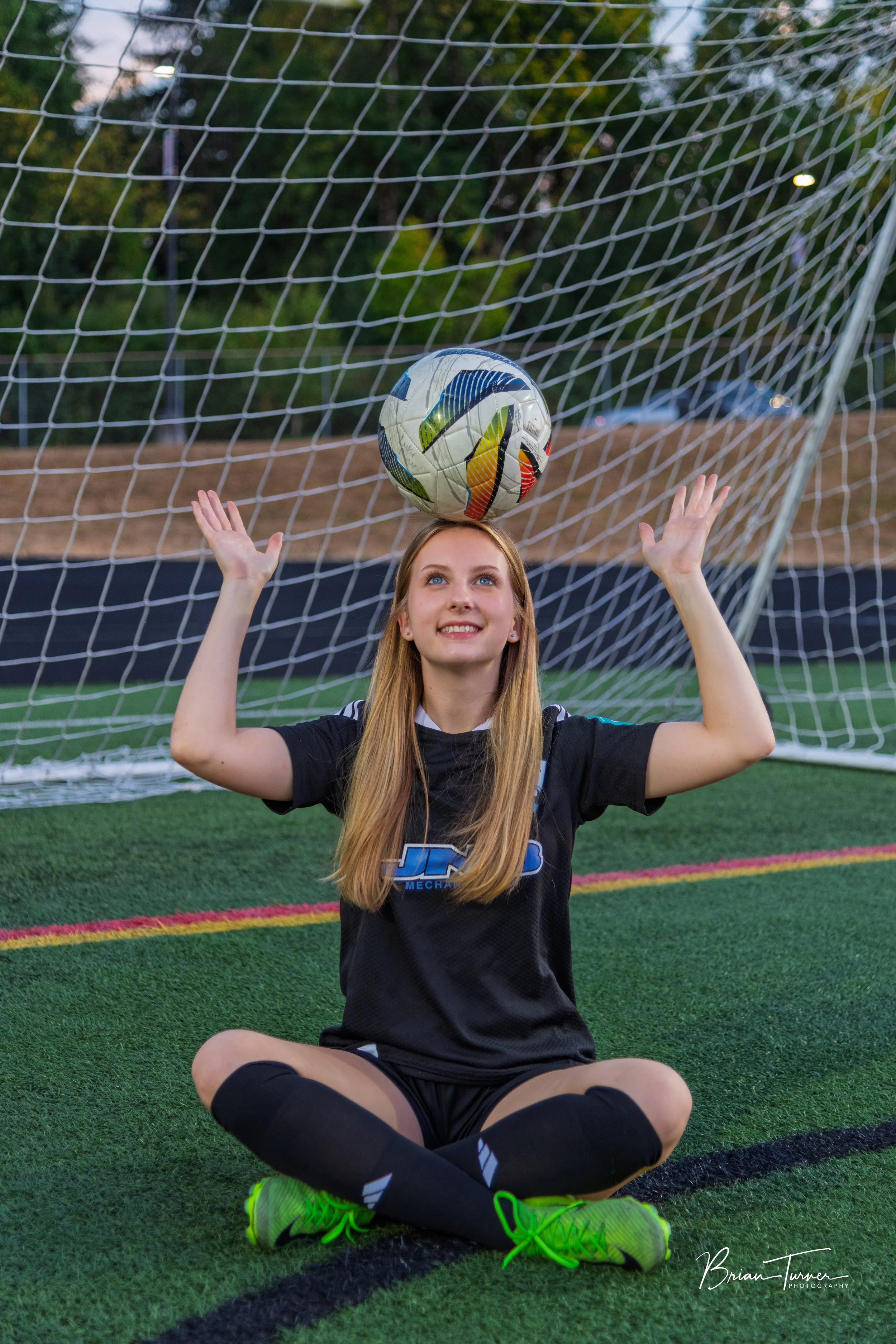 Senior portrait of a high school girl during a soccer session in Ridgefield WA by Brian Turner Photography