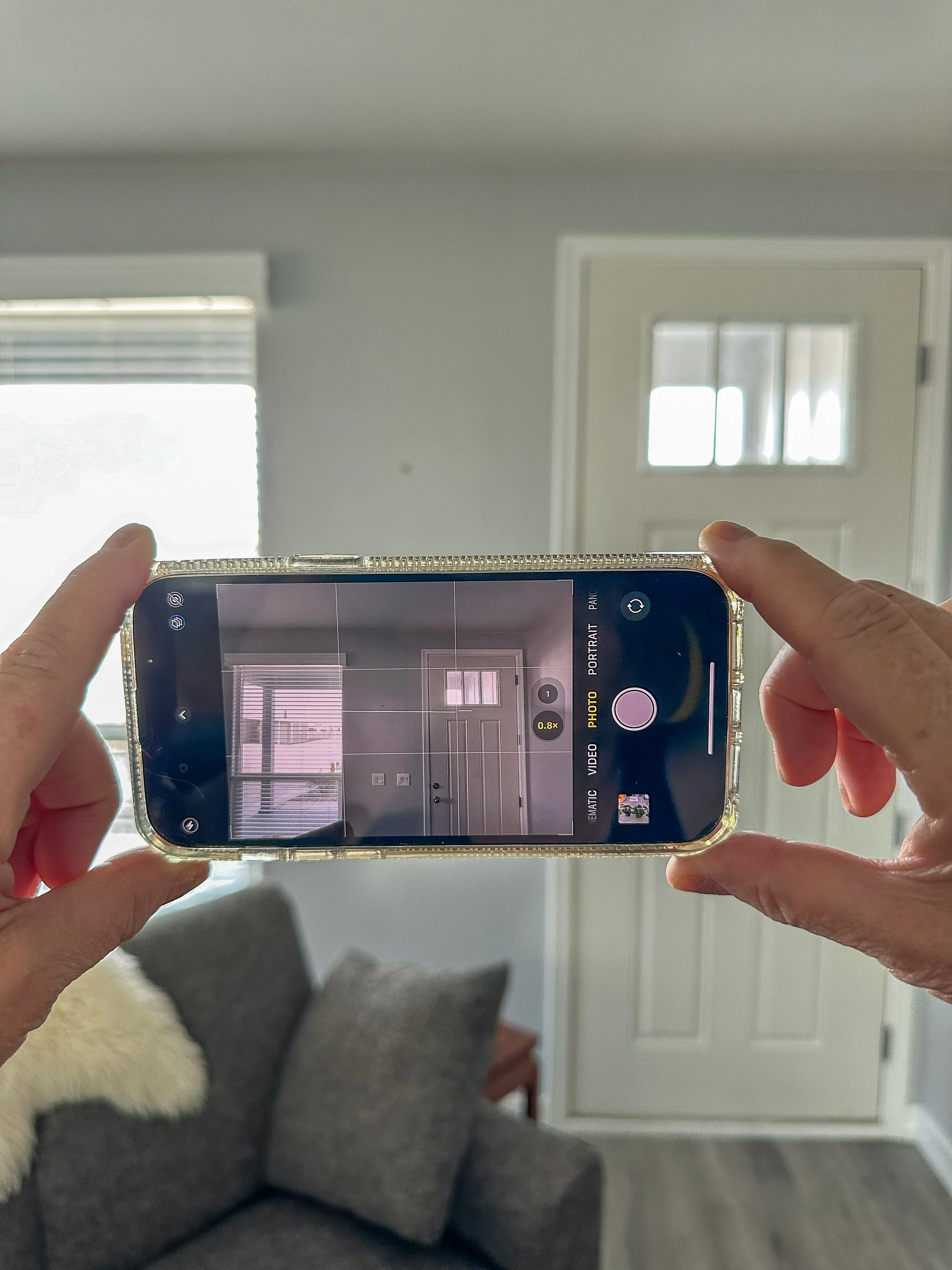 Cell phone taking a photo in a house