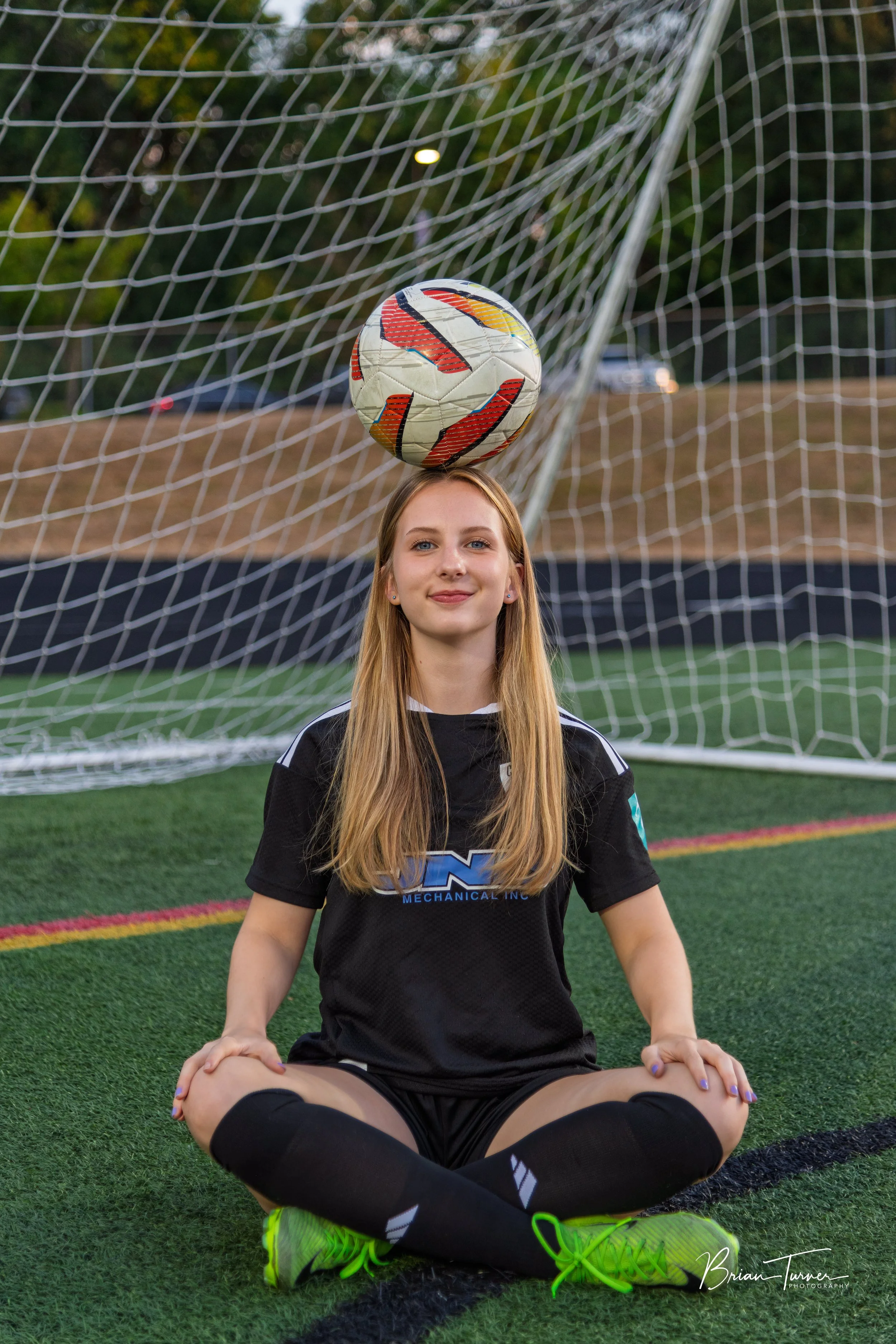 Senior portrait of a high school girl during a soccer session in Ridgefield WA by Brian Turner Photography