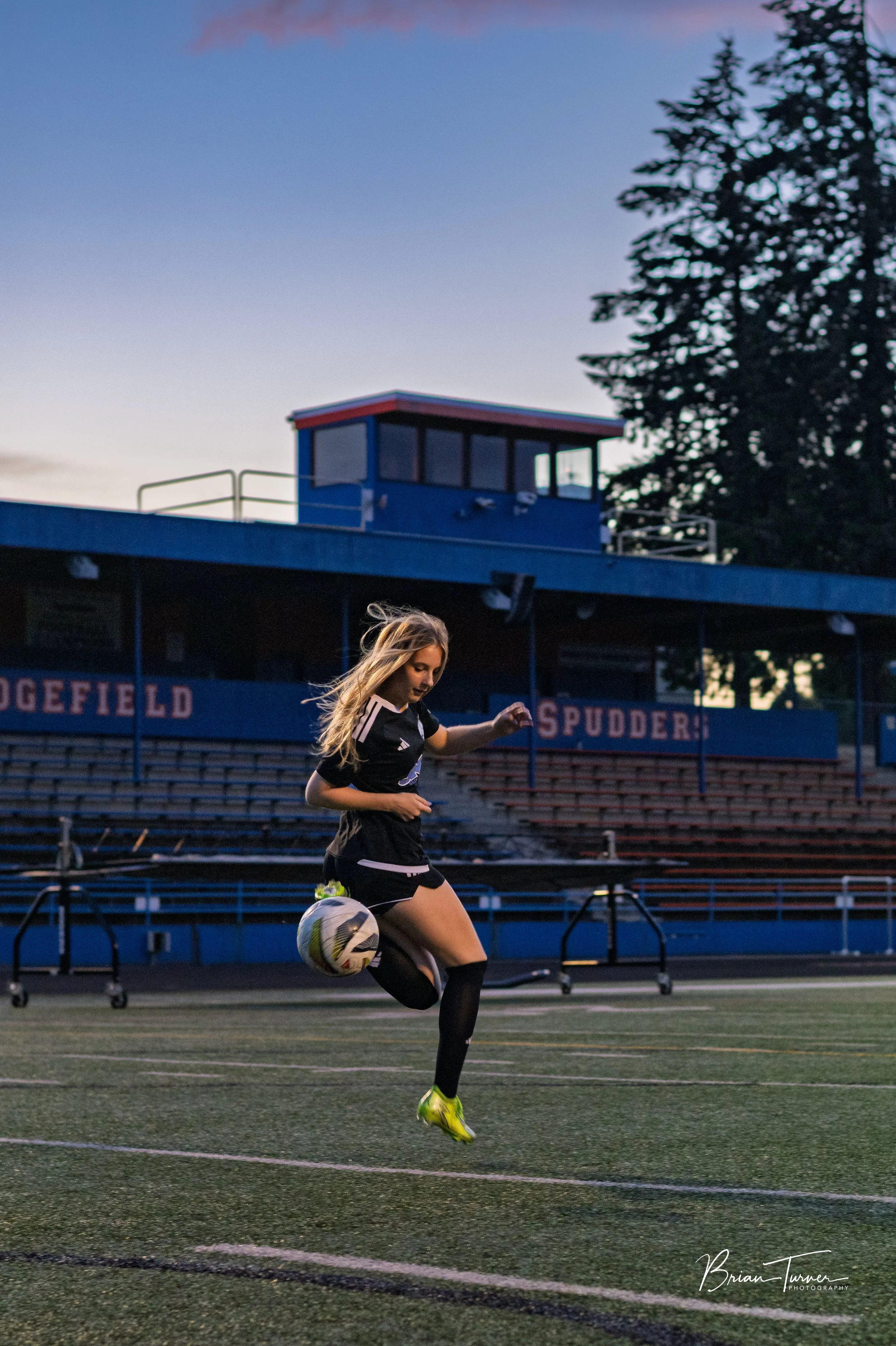 Senior portrait of a high school girl during a soccer session in Ridgefield WA by Brian Turner Photography