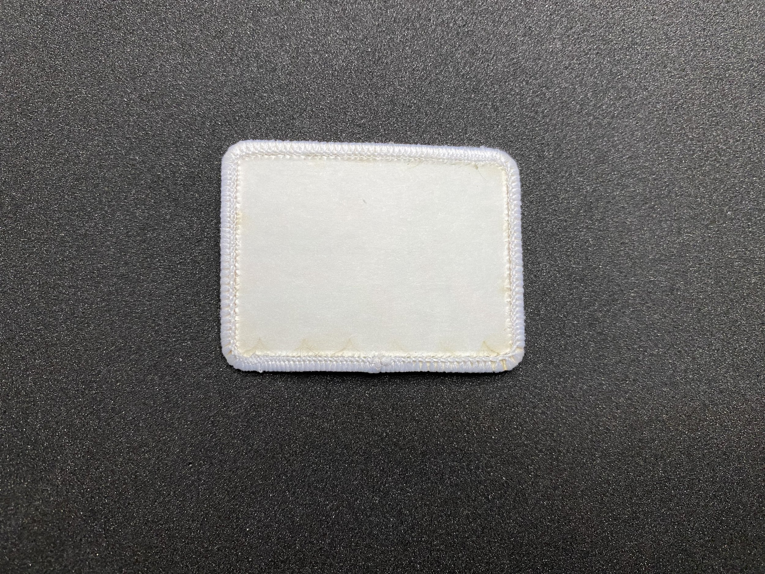 Small Badge Back.jpg