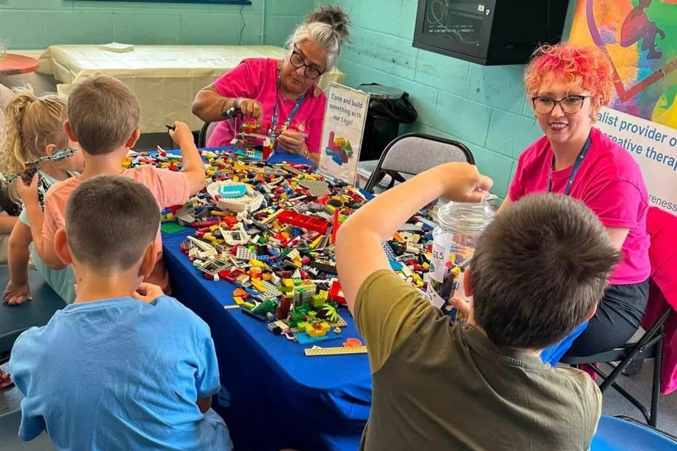 Kids Inspire Community Engagement team doing a LEGO activity with children supporting their mental health