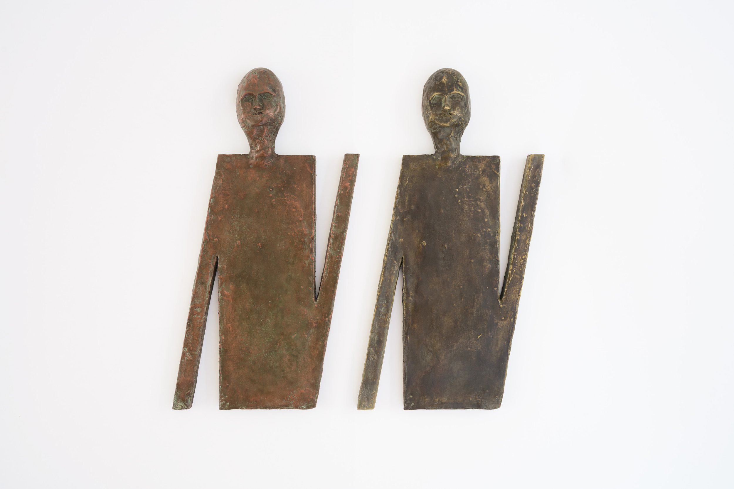 (L) Enrico David, Floor Element II (copper study), 2026. Copper, 55 x 27 x 3 cm. (R) Enrico David, Floor Element I (brass study), 2026. Brass, 55 x 27 x 3 cm. 