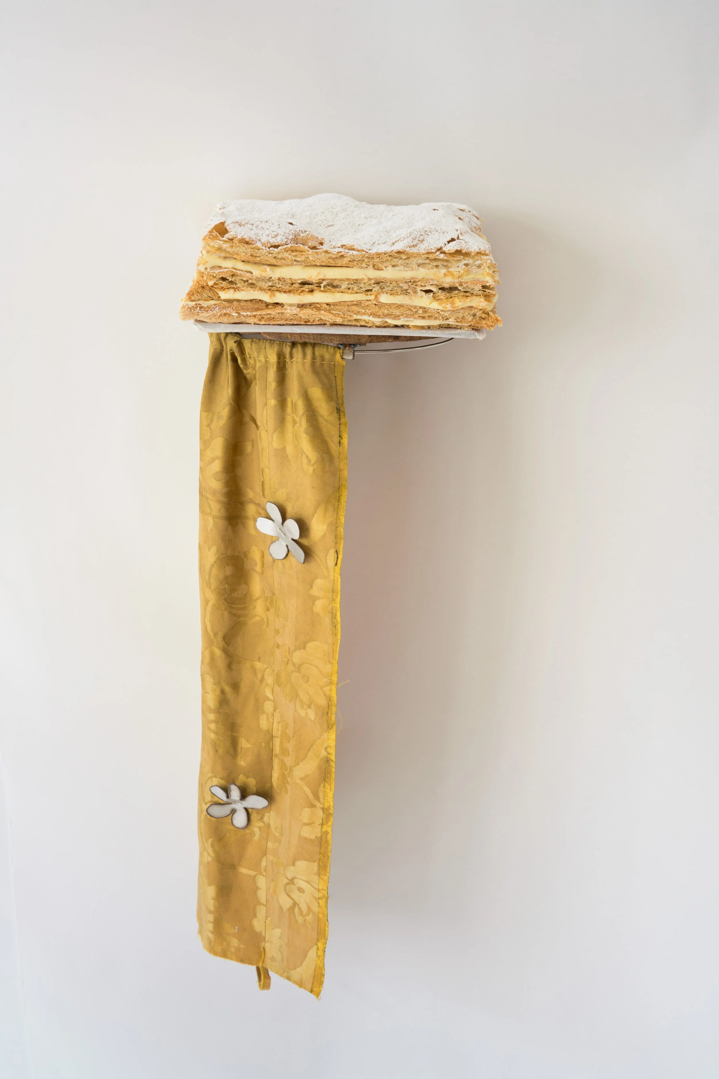 Kira Freije, Promise Arrangements, 2026. Stainless steel, wood, brass, 18th century silk, 71 x 25 x 20 cm. 