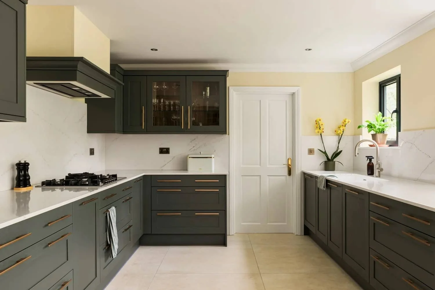 Glorious green and gold shaker kitchen in Woking