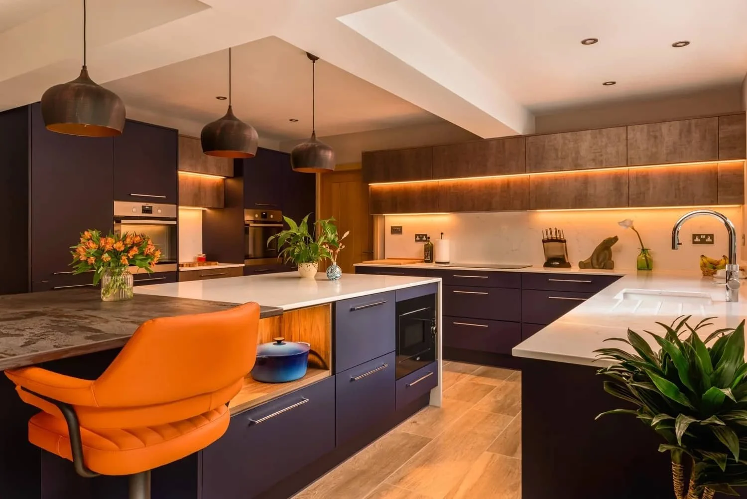 Unique blue and copper modern kitchen in Horsham