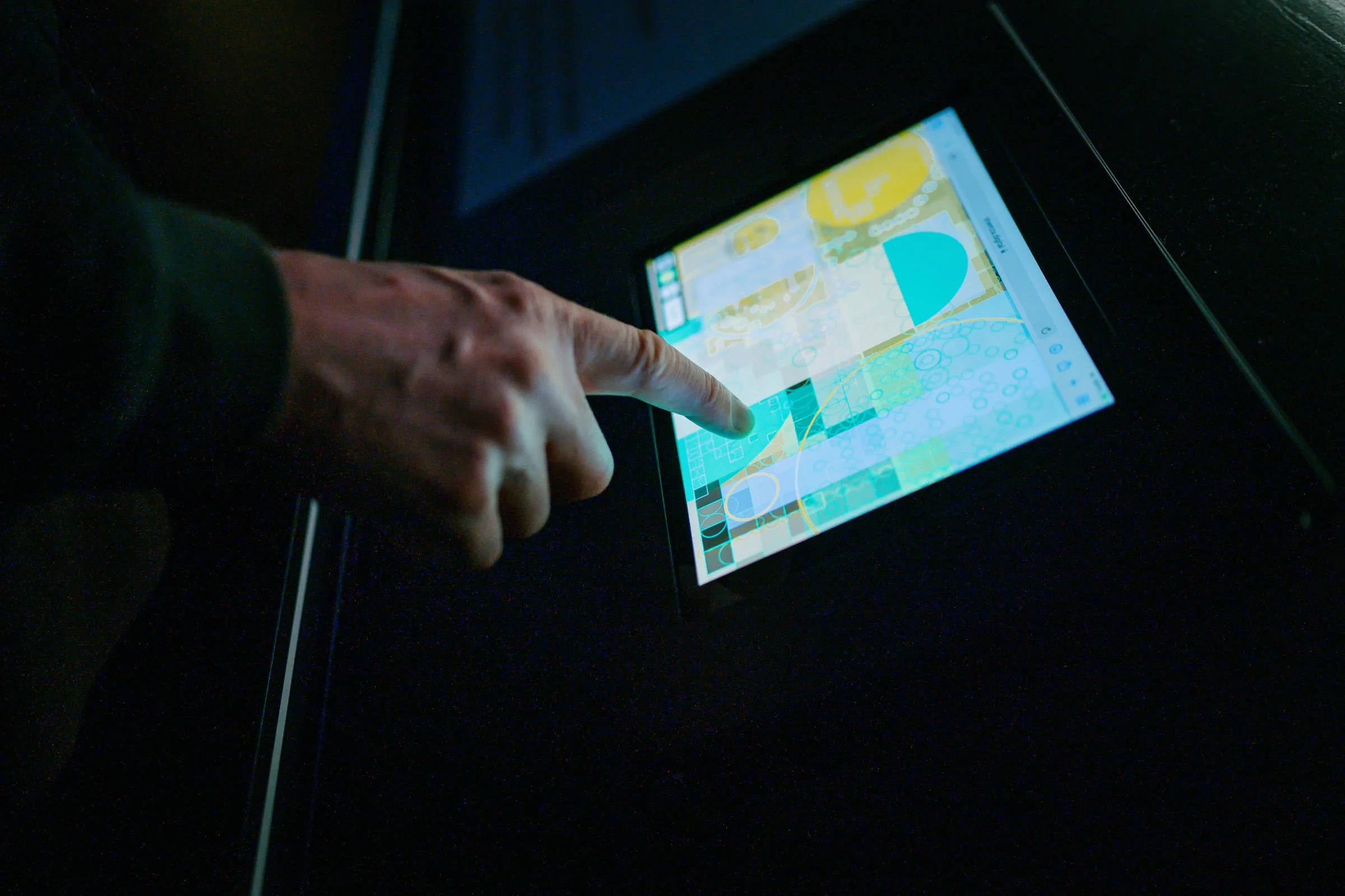 Participant using the interactive painting application on an iPad to contribute to shemza.digital #4–7.