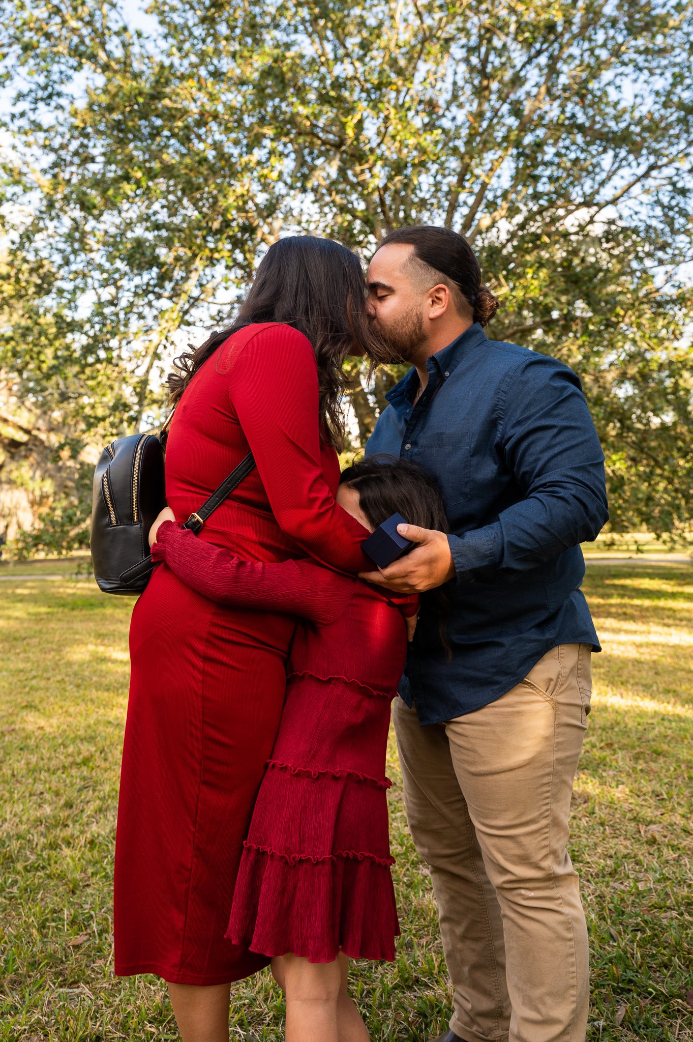 Couple Kissing In Park