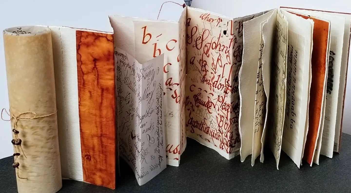 // Issue 65 - Memorabilia //
Artist: Ellie Garraway
@firejar
https://www.firejar.co.uk/
Description: Watershed... … or turning point.
A cherished calligraphy sketchbook belonging to my late father was rescued from a sodden portfolio caught