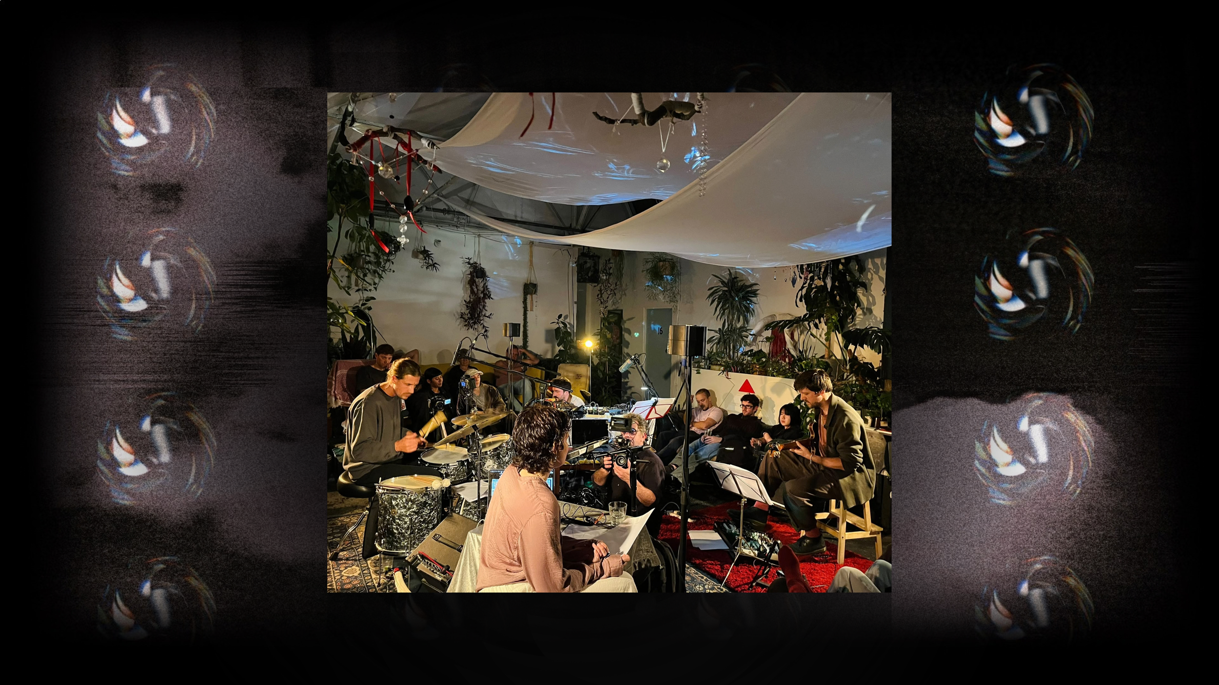 background: a still from visuals for the show. front: band in action.