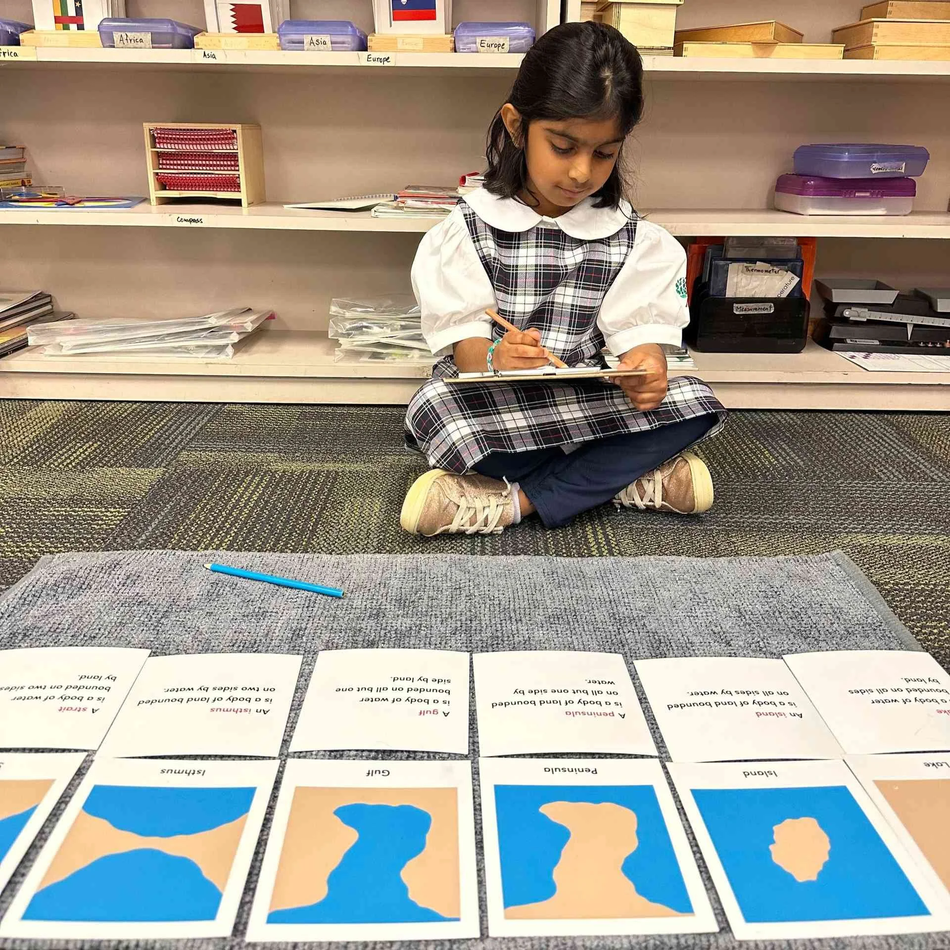 Student working with Montessori beads and materials in Allen, TX
