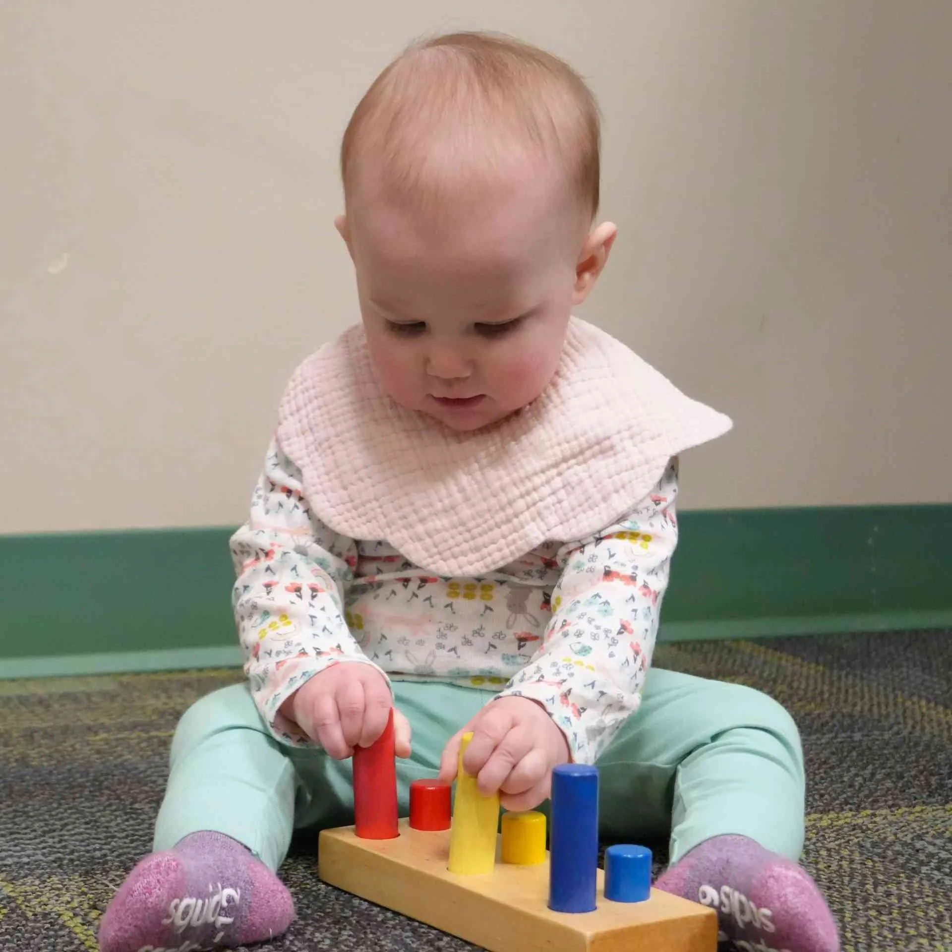 Student working with Montessori beads and materials in Allen, TX

