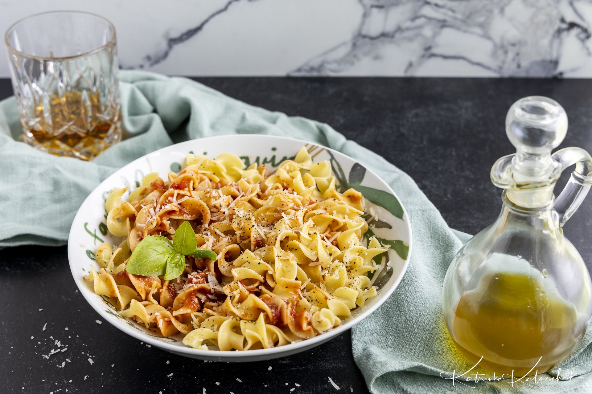 Marinara Sauce Over Buttered Egg Noodles