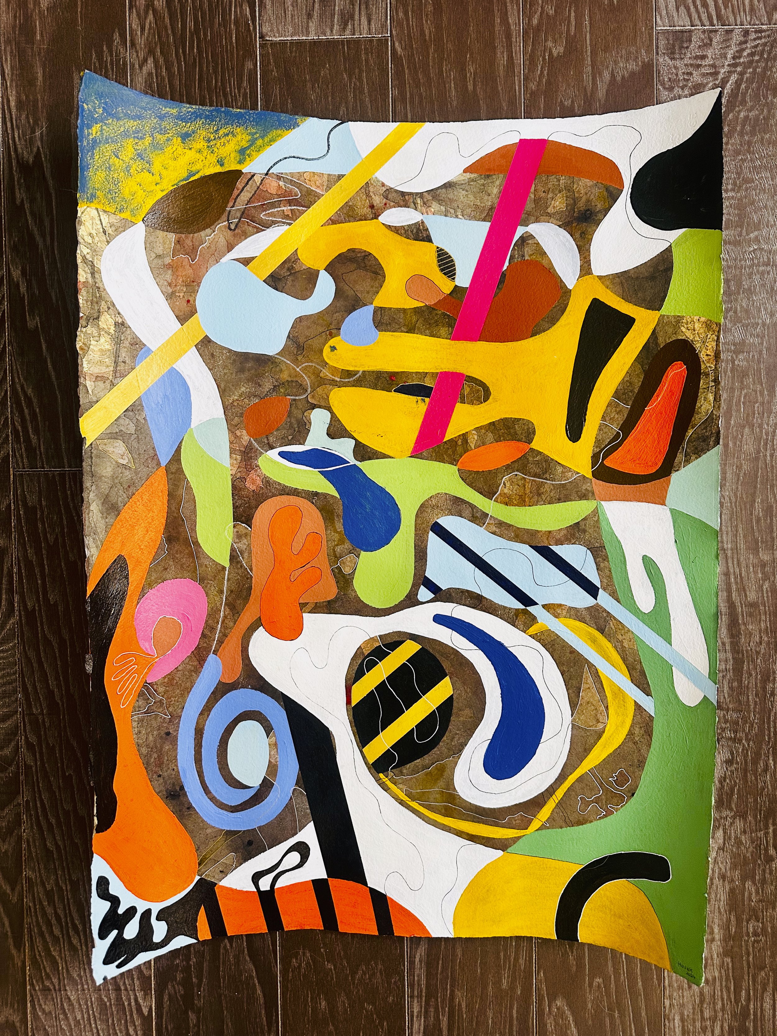 Abstract colorful painting with various shapes, lines, and patterns, including yellow, blue, orange, black, white, and green elements on a brown textured background.