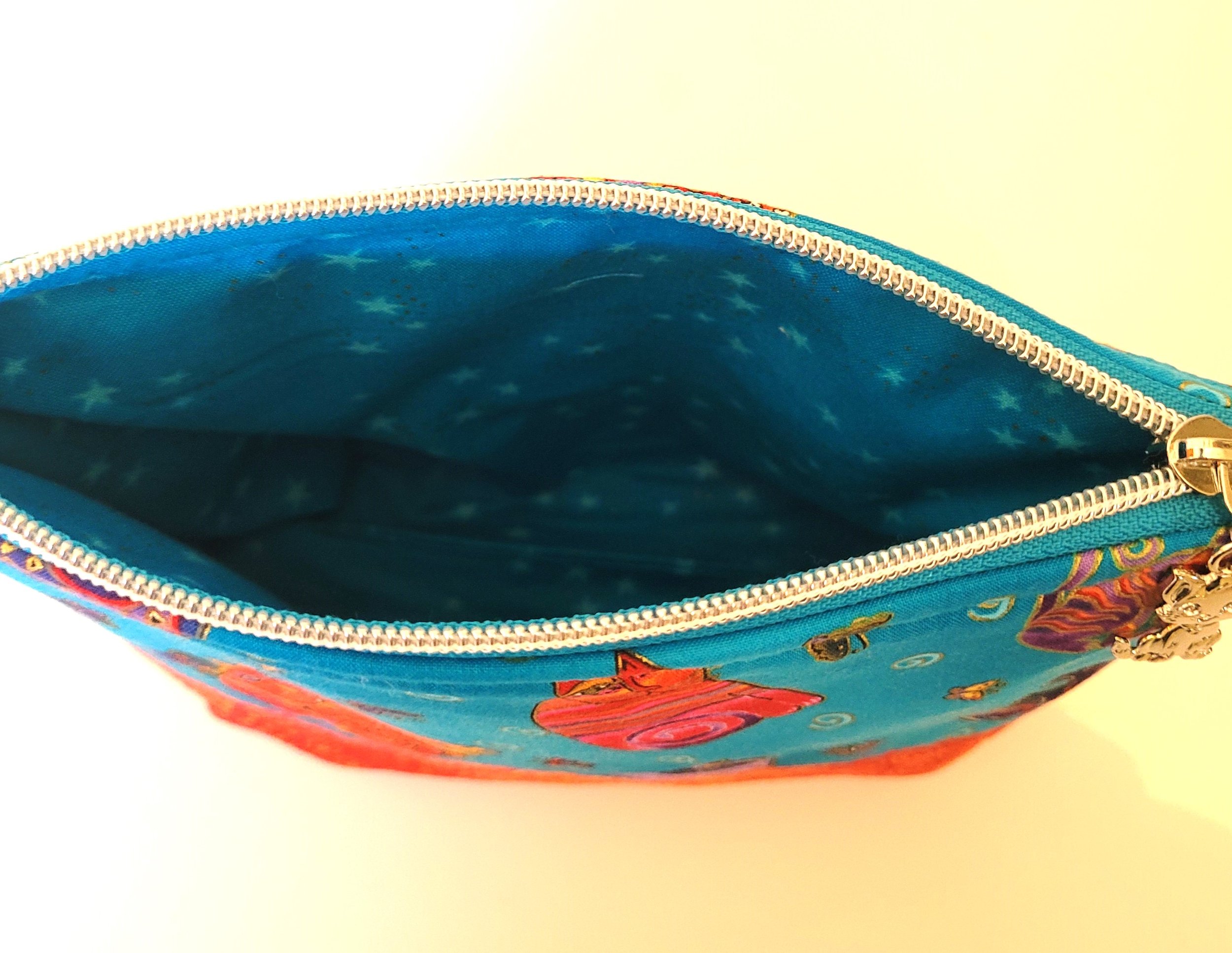 Turquoise Orange Cats Inside Pouch.jpg