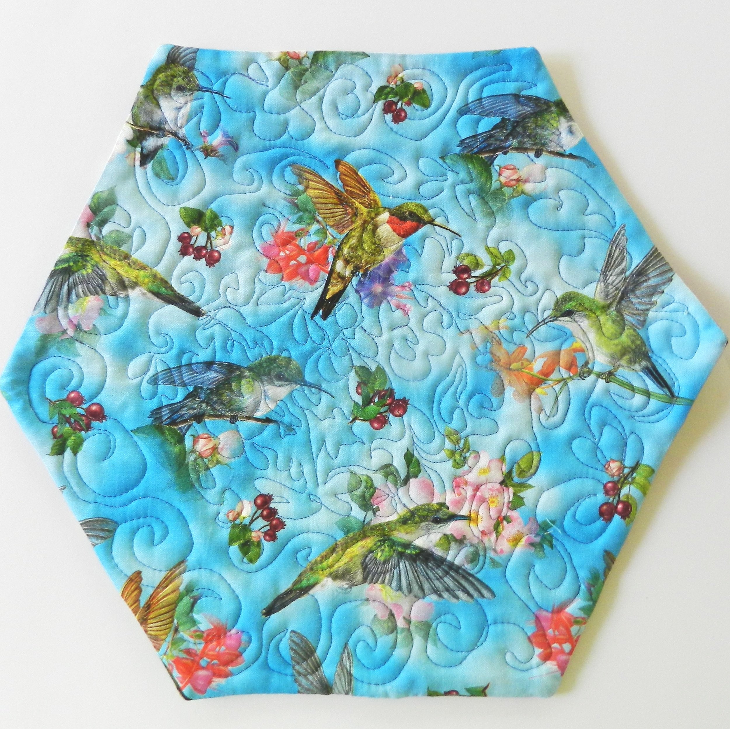 Blue+Hummingbirds+and+Packed+Bright+Butterflies+hexagon+Table+Mat+Back+Side.jpg